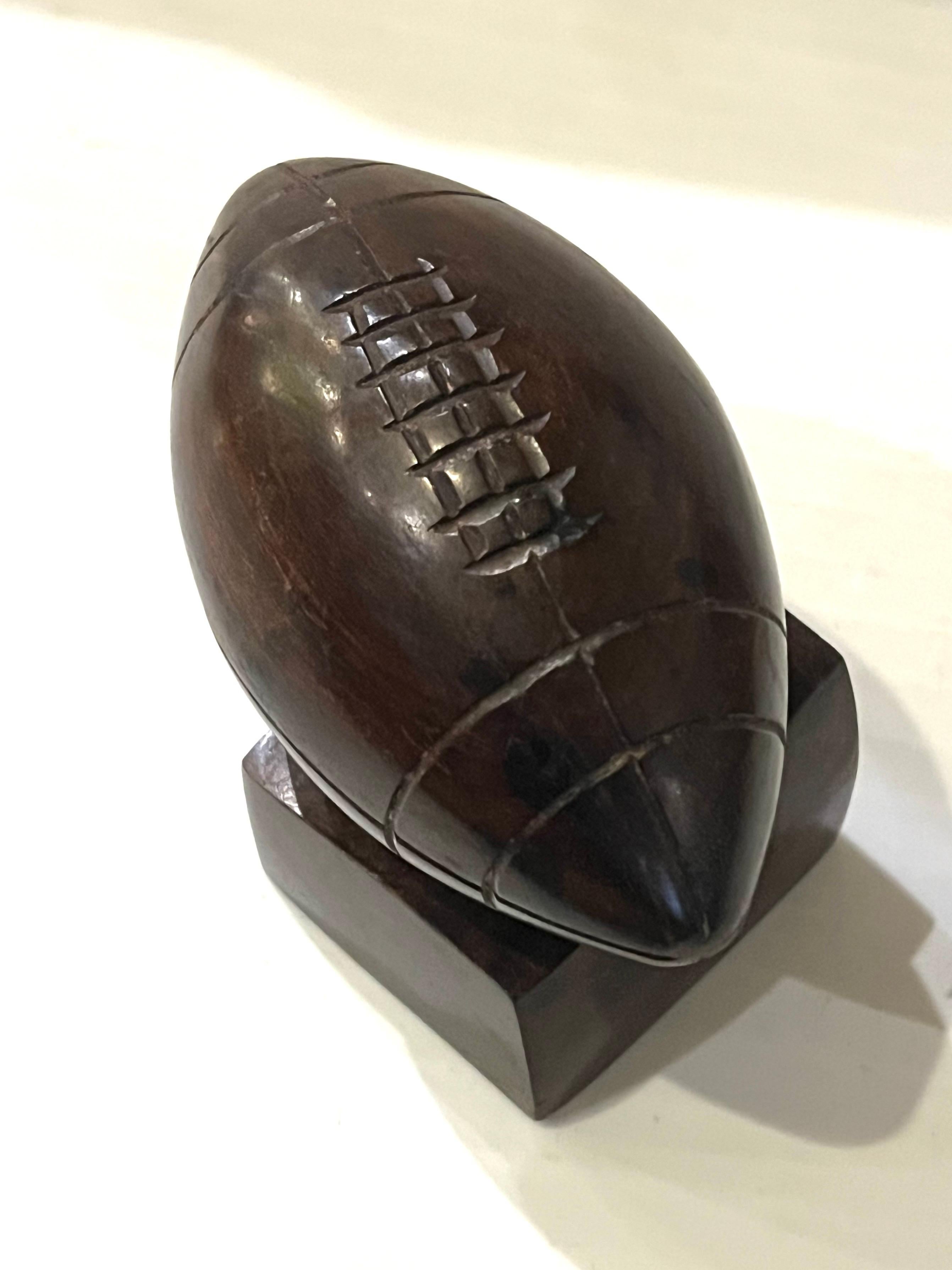 20th Century Classic Hand Carved Solid Ironwood American Football Sculpture For Sale