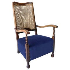 Classic Highback Lounge Chair with Blue Seat and Wooven Rattan Back