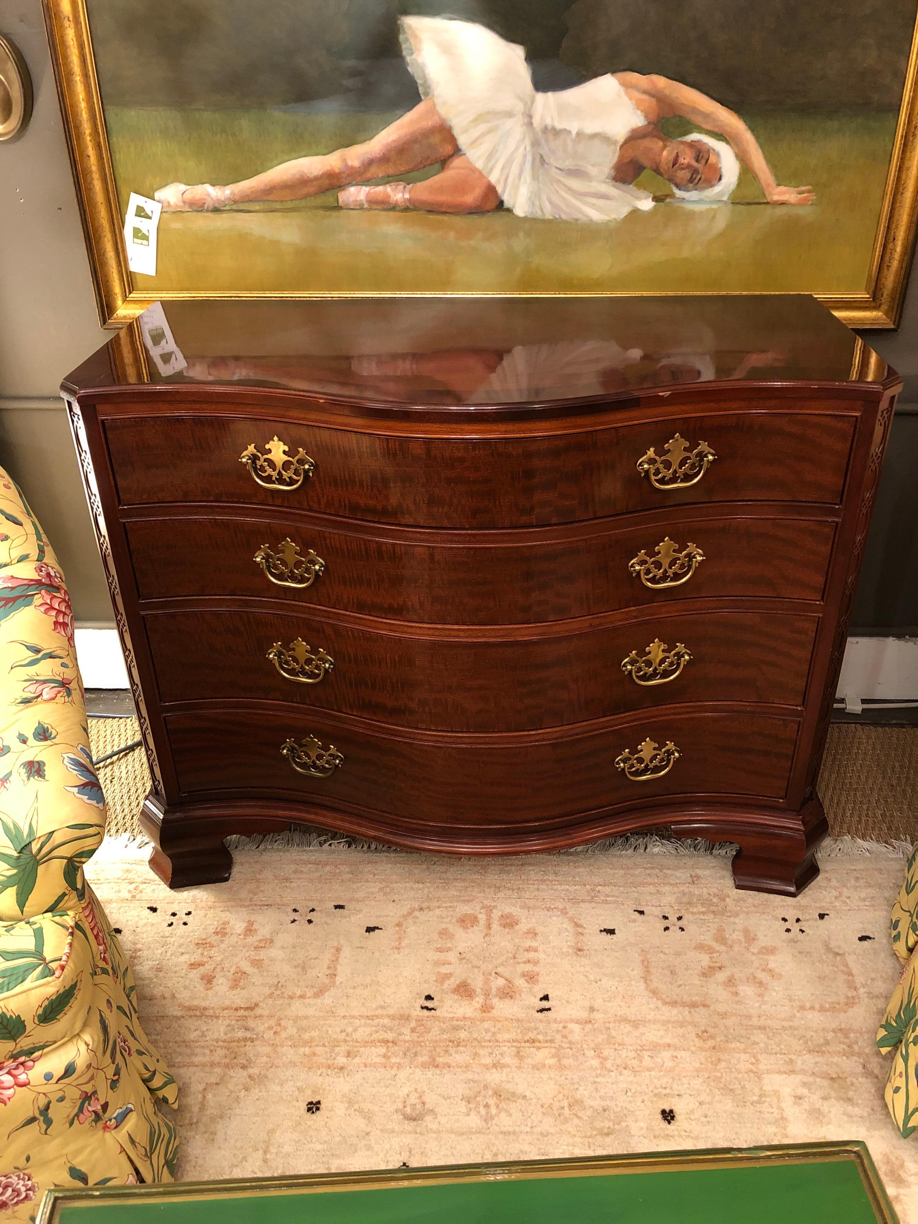 Baker honors Charleston's heritage and rich history by reproducing this 19th century bombay chest of drawers. Part of their “Historic Charleston” collection the top has a hand carved gadroon border, dovetailed drawers, classic brass pulls and