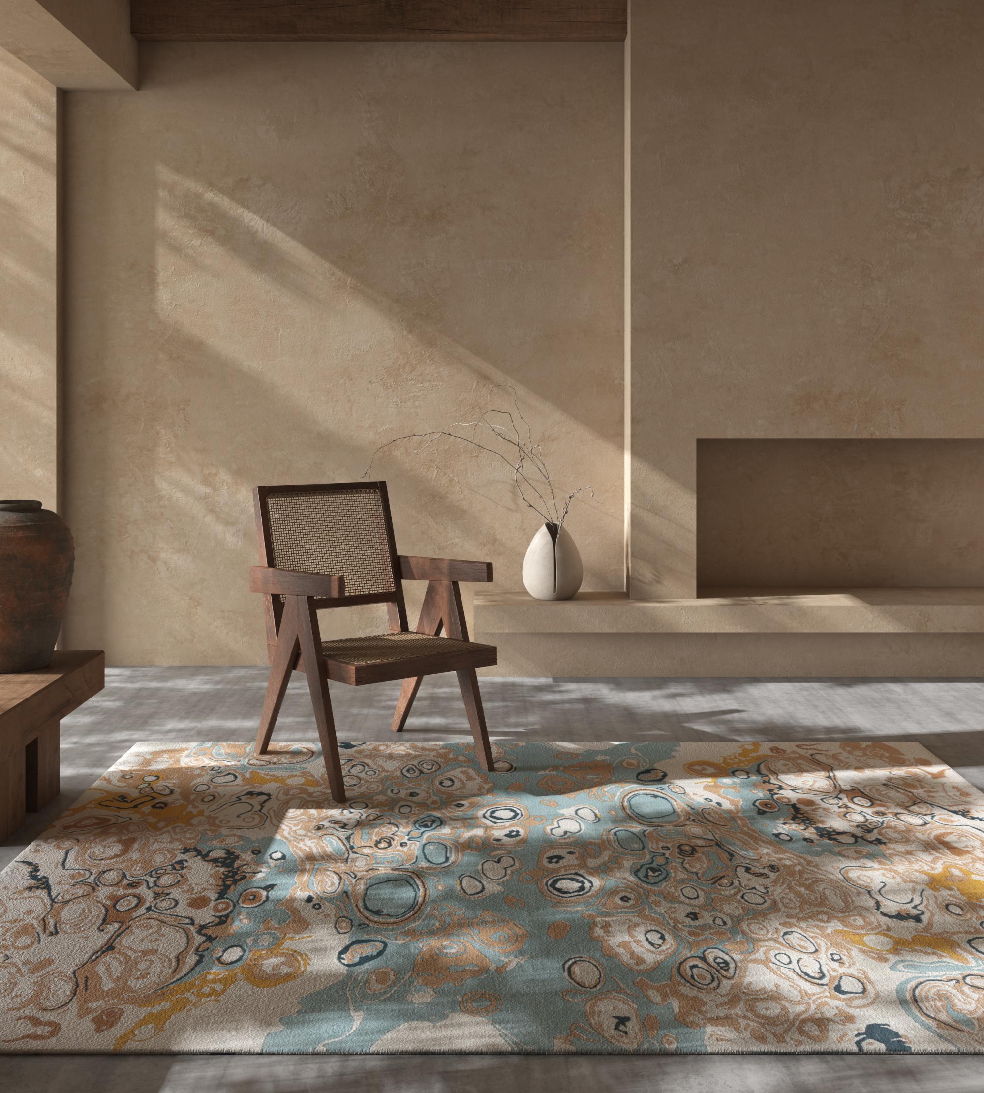 This rug is an exquisite blend of traditional craftsmanship and contemporary design, presenting a visually striking addition to any living space. This rectangular rug features an exquisite pattern in snow white and Indian tan, creating a harmonious