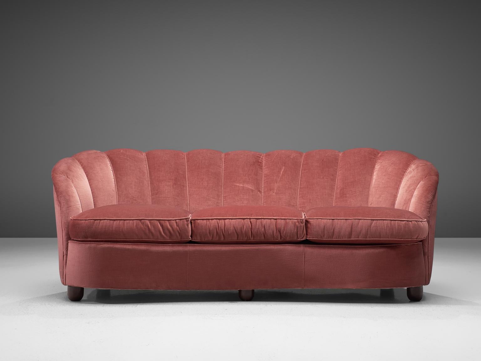 Sofa, pink velvet and oak, Italy, 1960s. 

This ornate, cute but grand comfortable sofa is strong and playful at the same time. The webbed back gives perfect support for the sitter. The thick seat with removable cushion creates a nice balance
