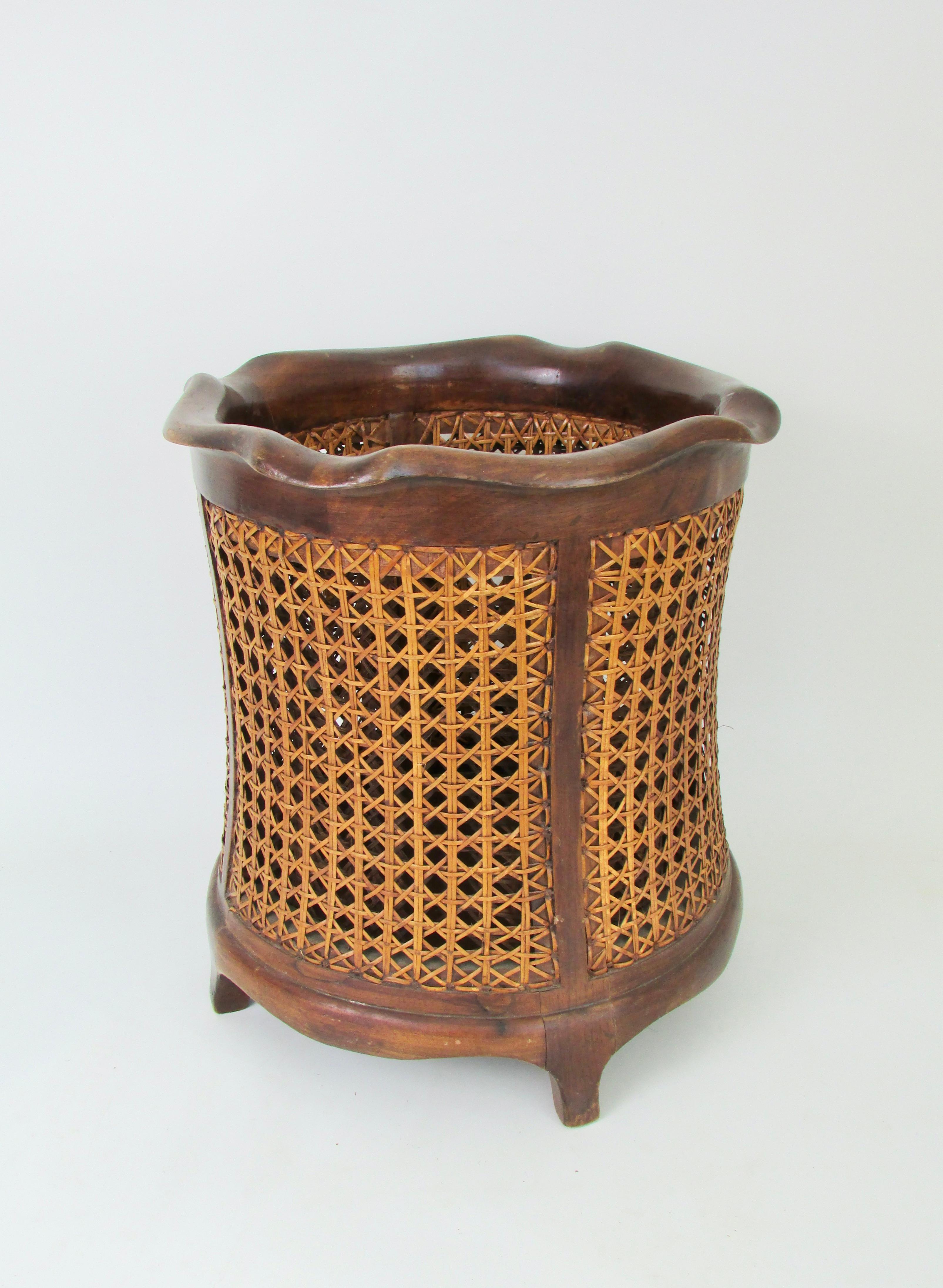 Cane Classic Italian solid walnut waste basket with hand caned side panels