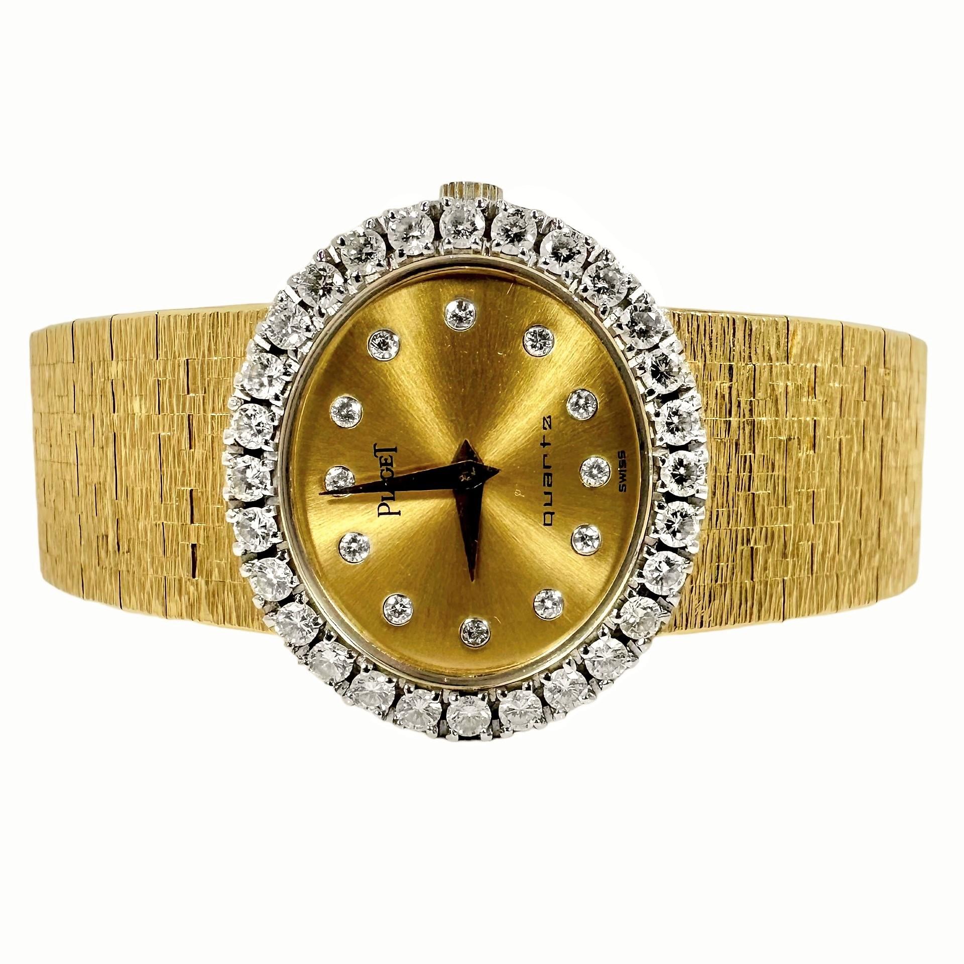 This skillfully executed 18k yellow gold and diamond ladies oval dial Piaget wrist watch is truly a magnificent example of the genre. Every surface glitters, either from light reflecting off of it's textured gold surfaces or light causing every