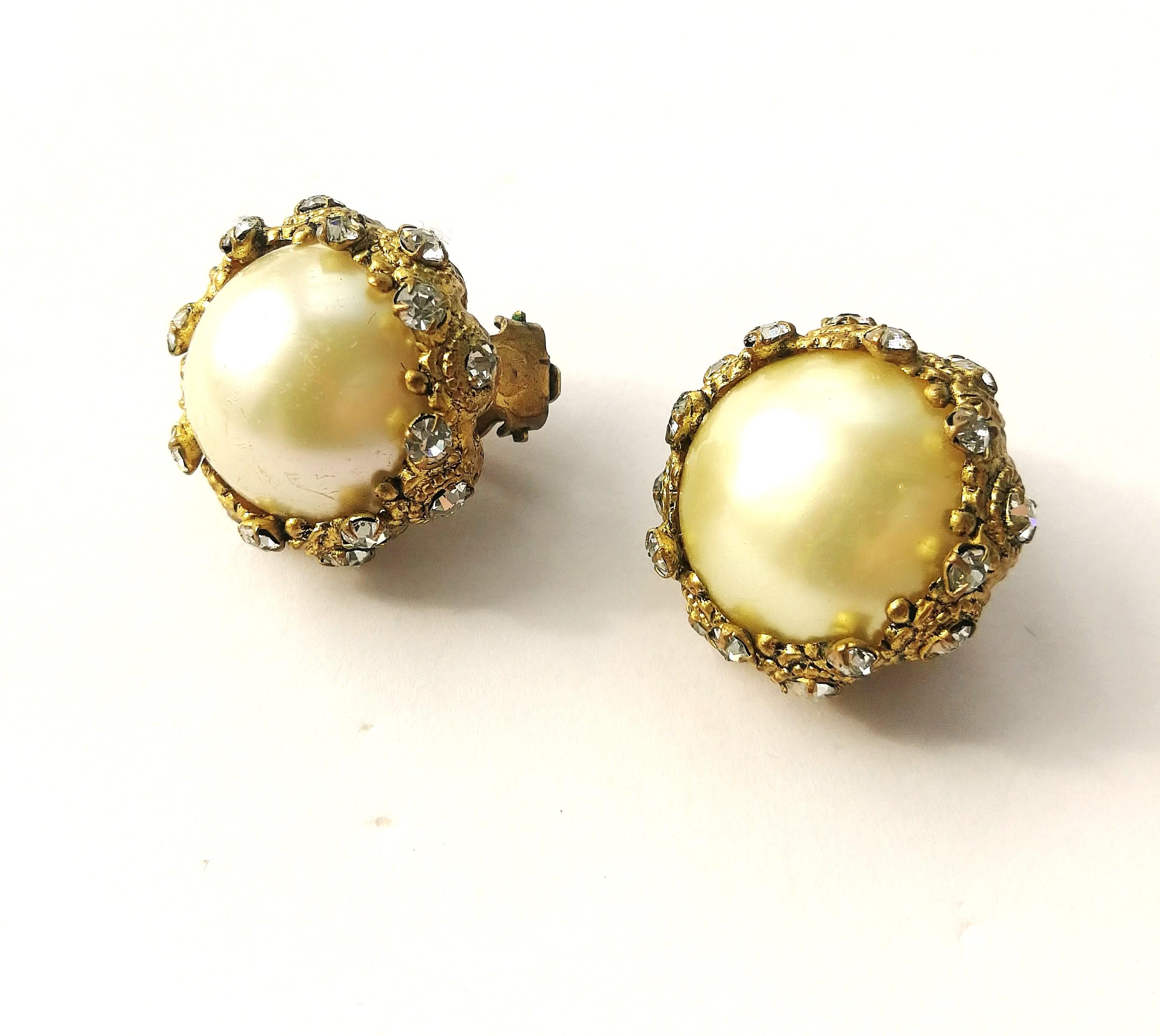 These highly classic and highly wearable pearl earrings from Chanel, made by Maison Goossens in the 1950s, offer the wearer the best of the original Chanel vintage style, handmade by artisans in Paris, and experience the unique and iconic Parisian