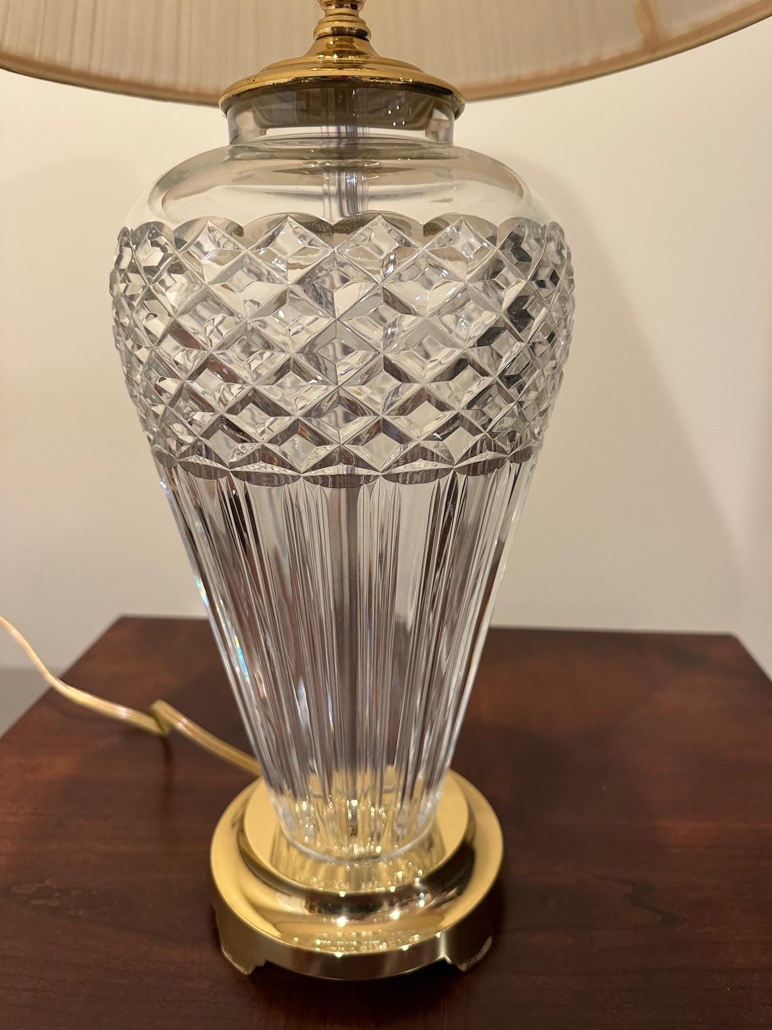 Timeless elegant Waterford crystal large table lamp.

28” H x 7” Diameter
Shade: 10.75” H x 17” W Bottom
