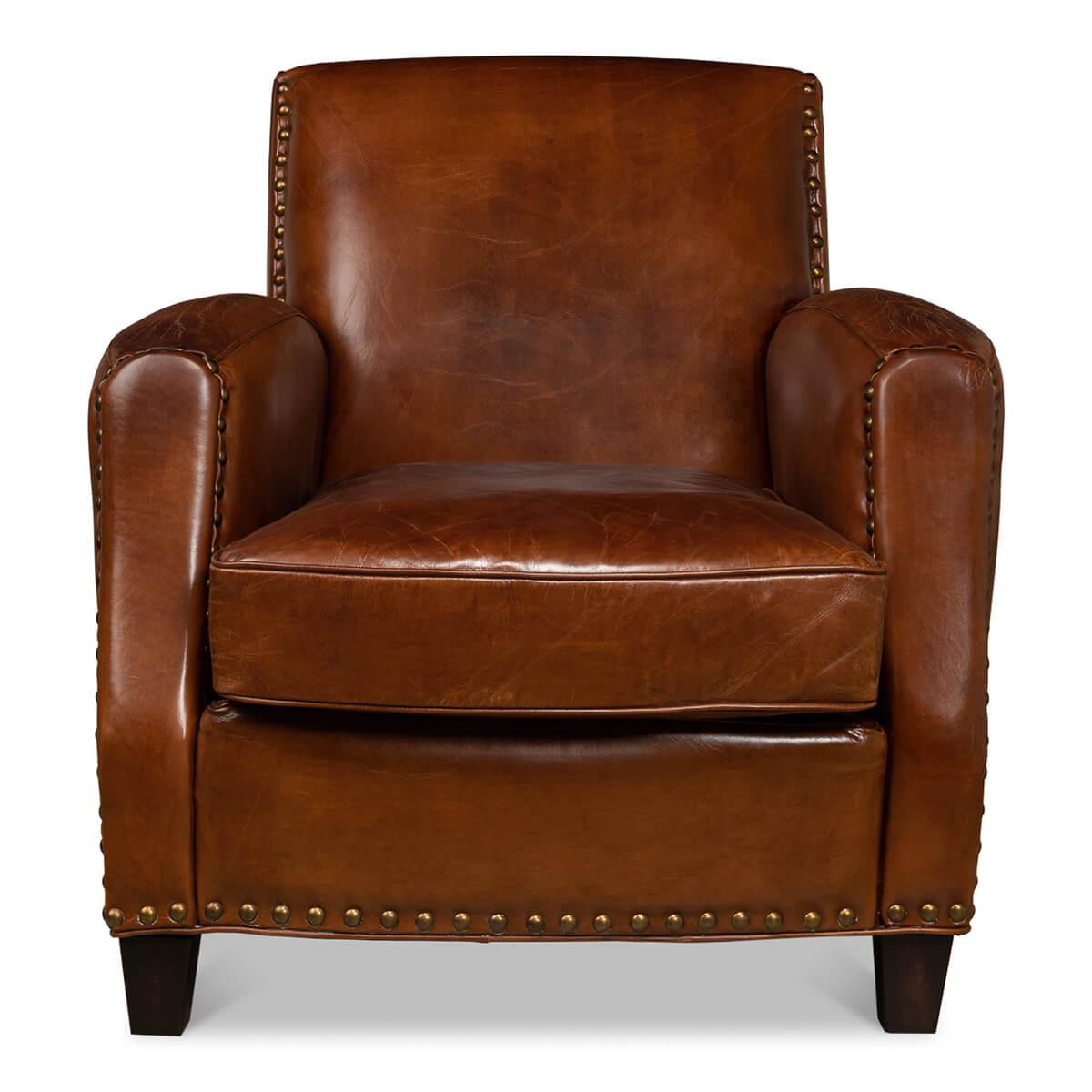 A Classic leather armchair with top-grain Havane brown color leather, with padded cushion and backrest, large nailhead details and square tapered legs.

Dimensions: 32