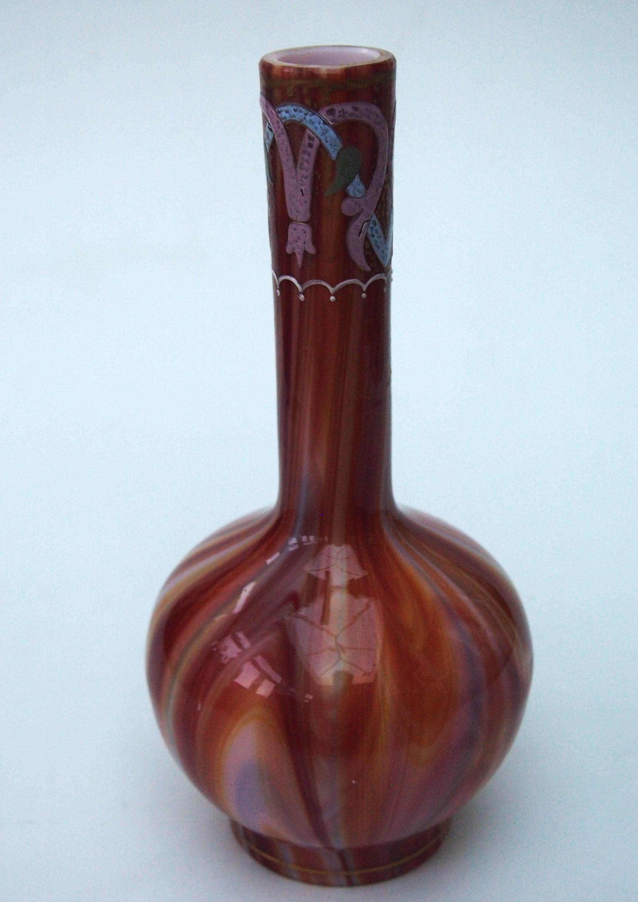 Classic Loetz 'ball and stem' vase in the early documented Onyx pattern in an unusual combination of  vibrant orange, red and brown over opaque white -this pattern dates to c 1887-8. The vase is decorated at the top of the neck with one of their