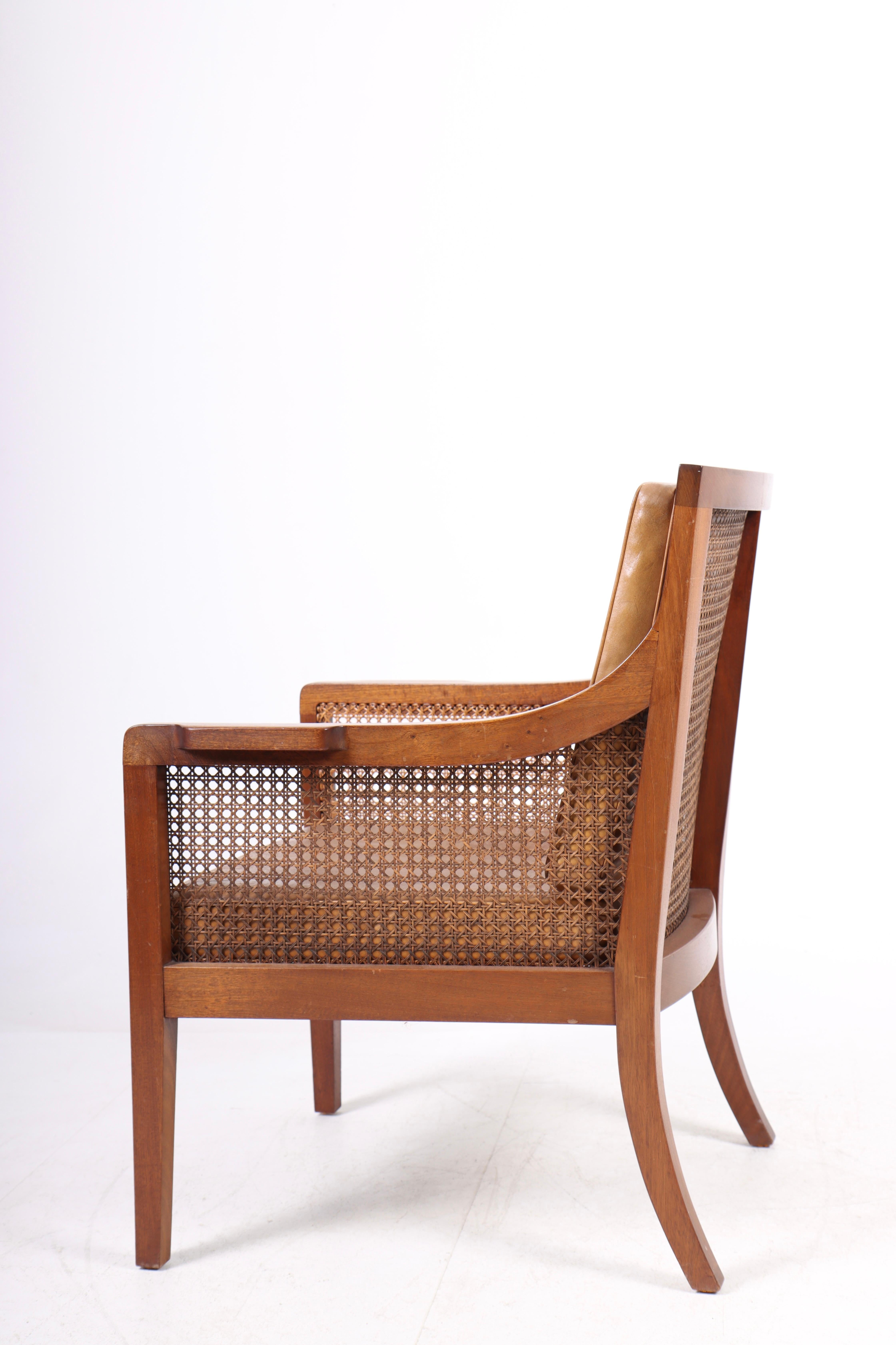 Danish Classic Lounge Chair in Mahogany and French Cane, Made in Denmark 1940s