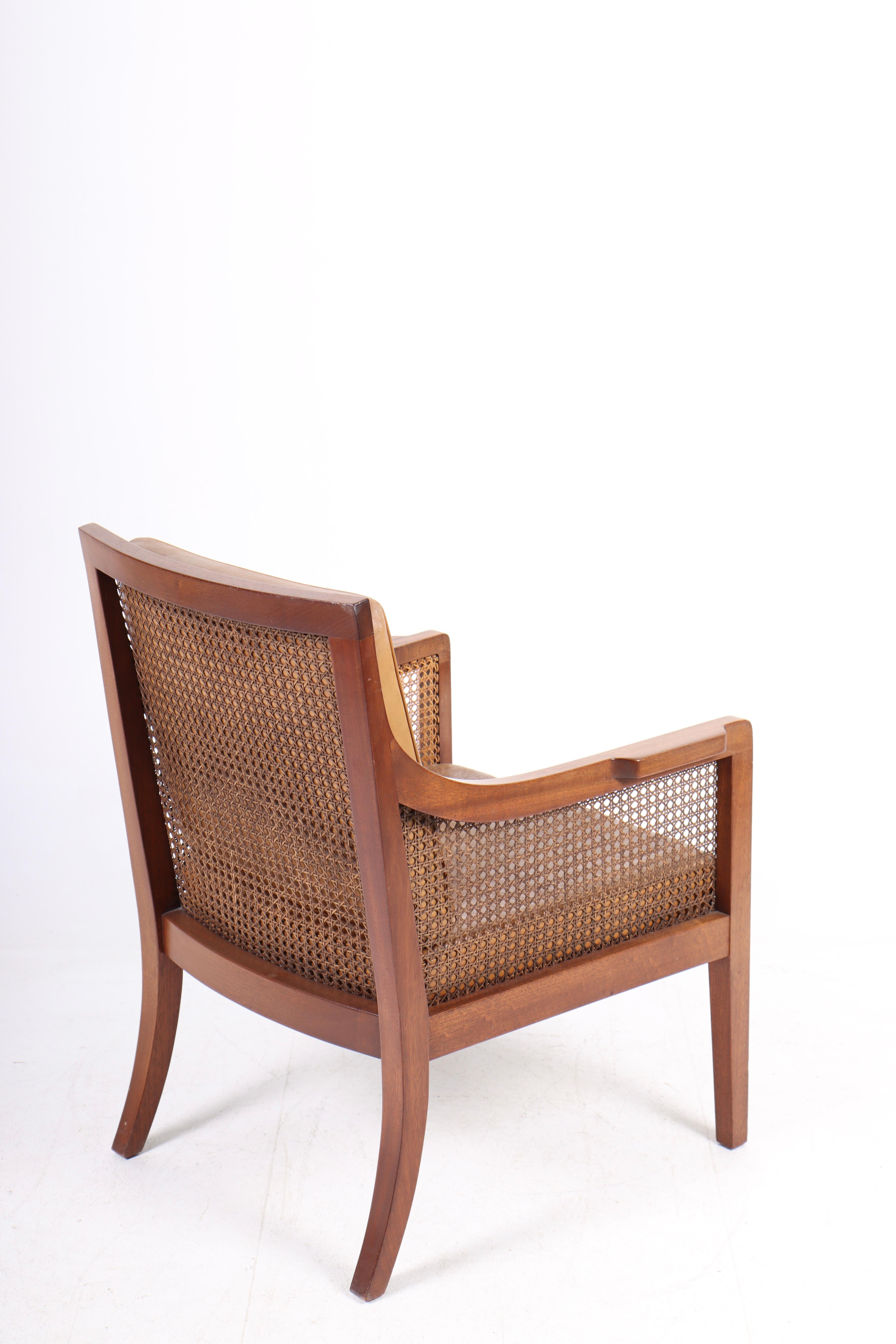 Mid-20th Century Classic Lounge Chair in Mahogany and French Cane, Made in Denmark 1940s