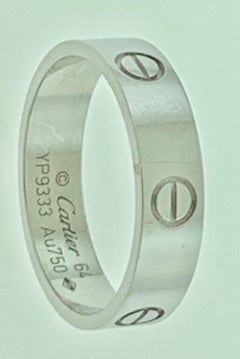 Classic "Love Ring" Made, Signed and Numbered by Cartier 18 Karat White Gold , 64