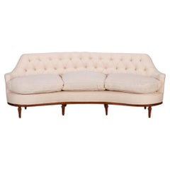 Classic luxurious tufted curved back sofa, C 1940.