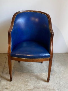 Classic Mahogany "Tub" Chair Covered in Hide with Brass Nail Trim