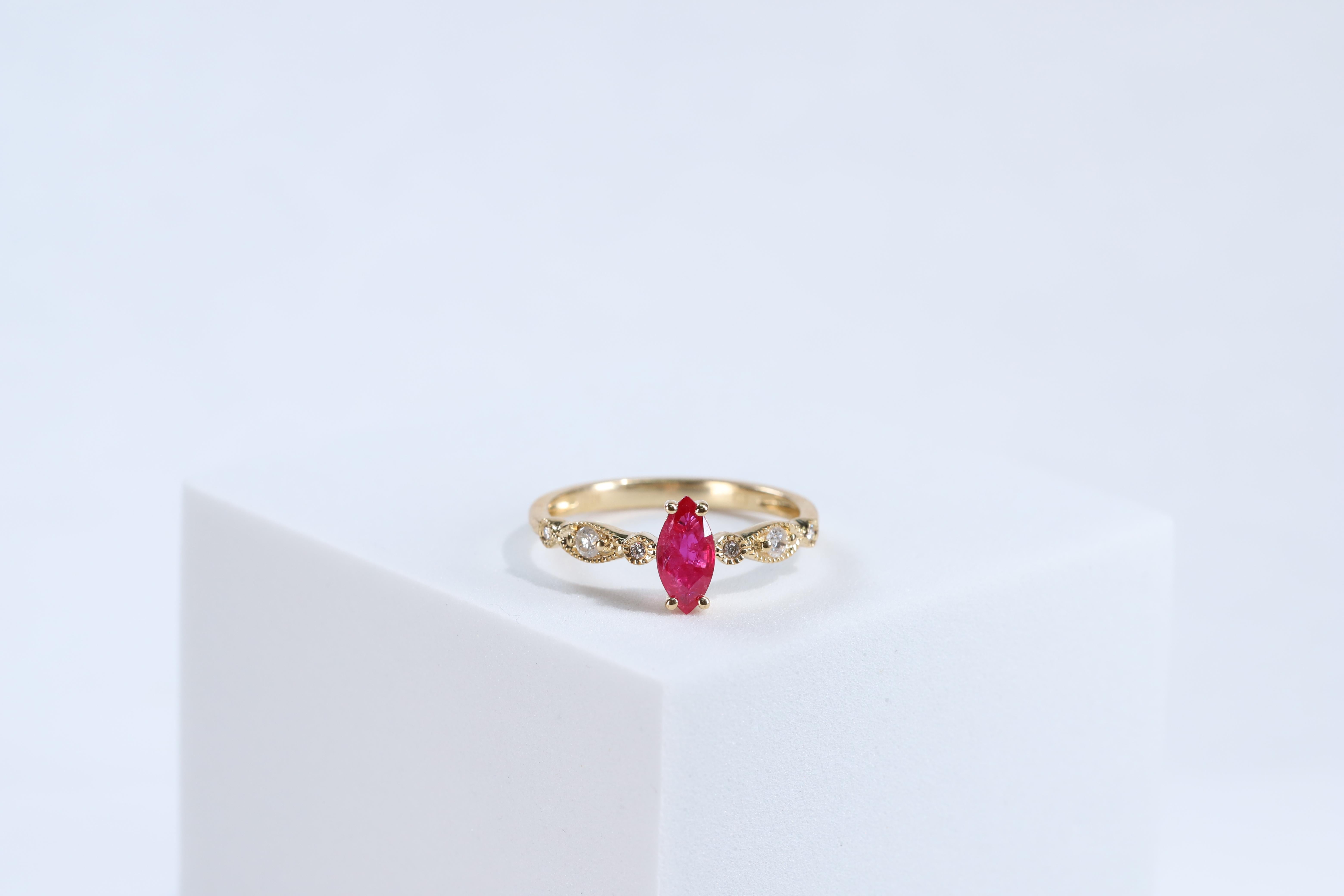 Art Deco Classic Marquise-Cut Ruby with Round-Cut Diamond 10k Yellow Gold Ring For Sale