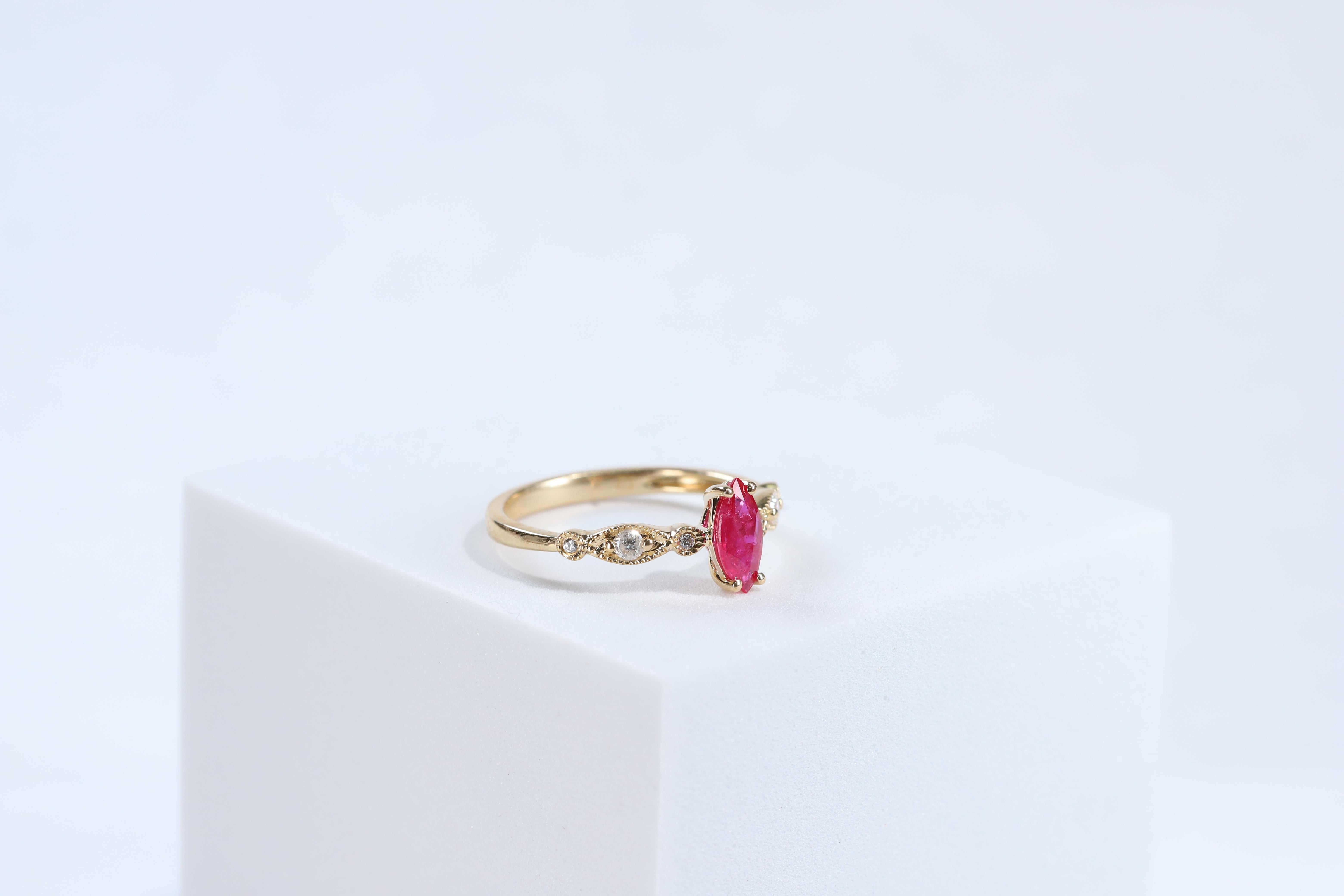 Marquise Cut Classic Marquise-Cut Ruby with Round-Cut Diamond 10k Yellow Gold Ring For Sale