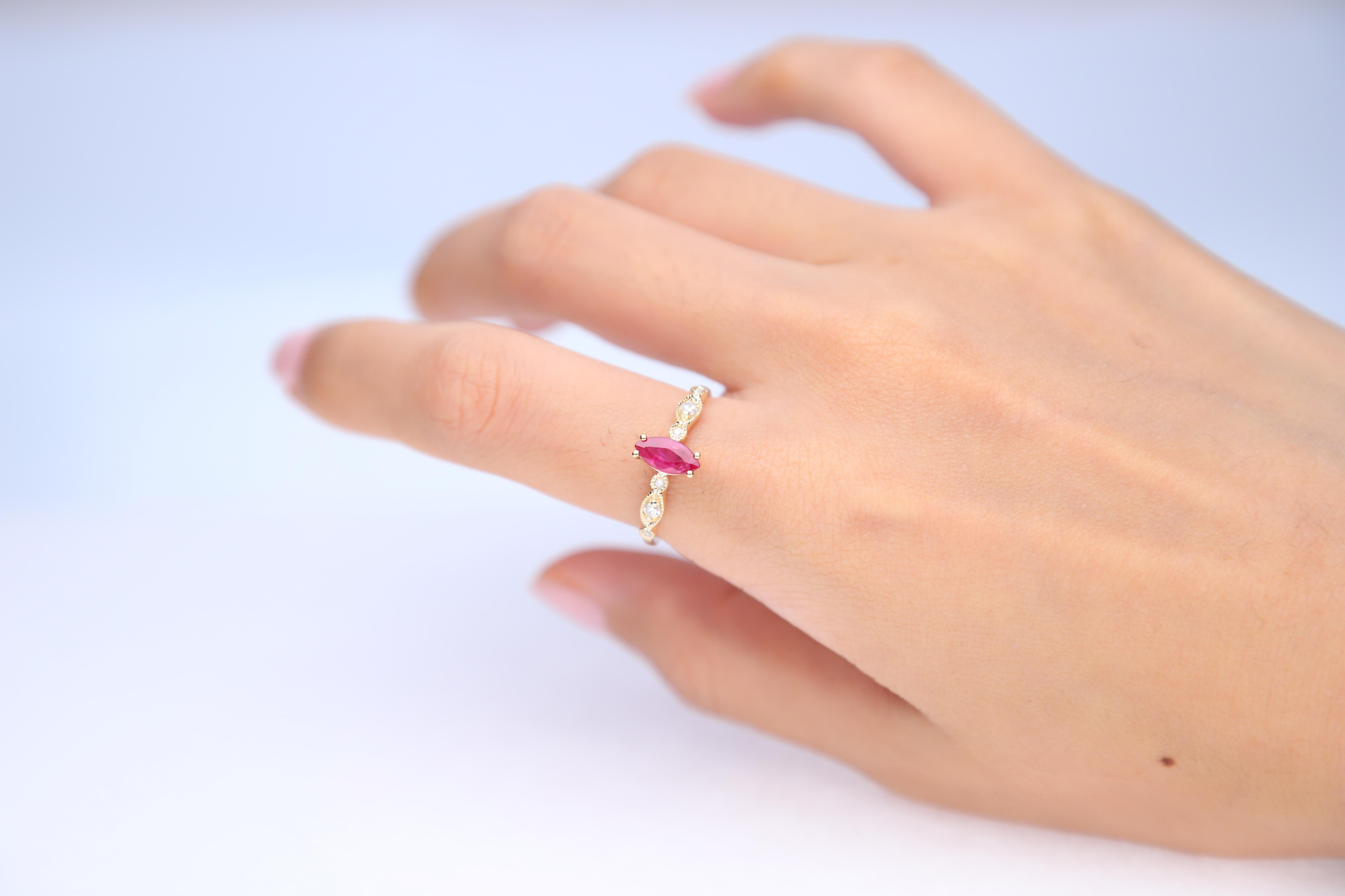 Stunning, timeless and classy eternity Unique Ring. Decorate yourself in luxury with this Gin & Grace Ring. The 10K Yellow Gold jewelry boasts with Marquise-cut 1 pcs 0.57 carat Ruby and Natural Round-cut white Diamond (6 Pcs) 0.10 Carat accent