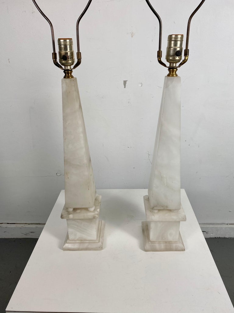 Classic matched pair Alabaster Obelisk table lamps, Italy, wonderful architectural design. Fit seamlessly into any modernist, antique, eclectic or contemporary environment.