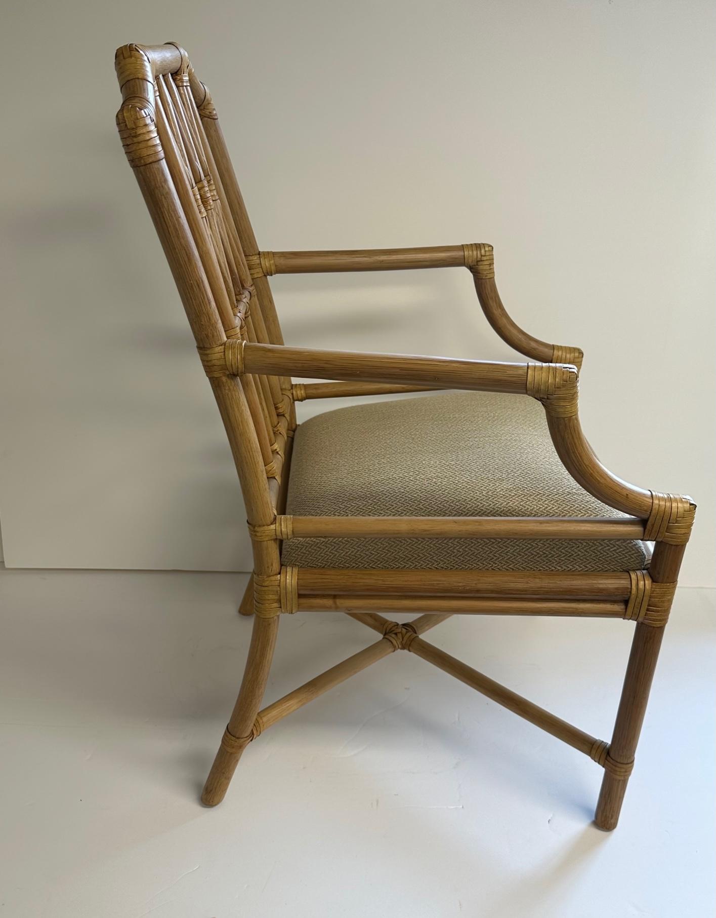 Never goes out of style McGuire bamboo armchair having neutral upholstered seat.  Arm height 26