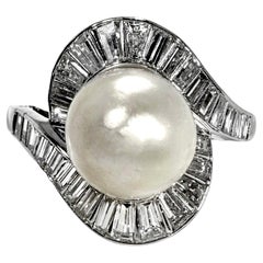 Classic Mid-20th Century Platinum, Natural Pearl, and Baguette Diamond Ring