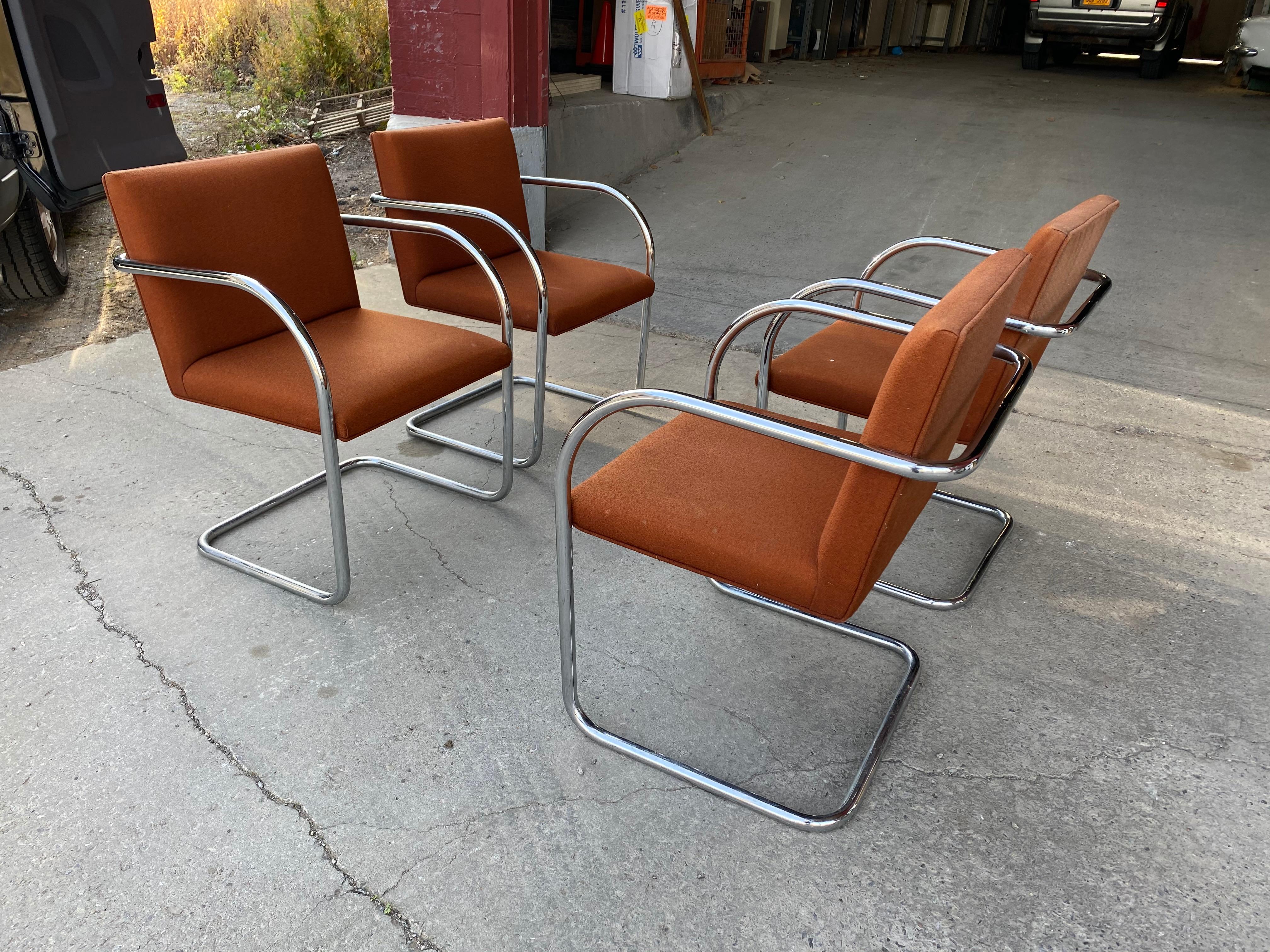 Classic set of 4 midcentury Brno chairs by Mies van der Rohe for Gordon International, beautiful polished chrome tubular steel, retain original orange wool fabric, minor blemishes and sun fading to backs.