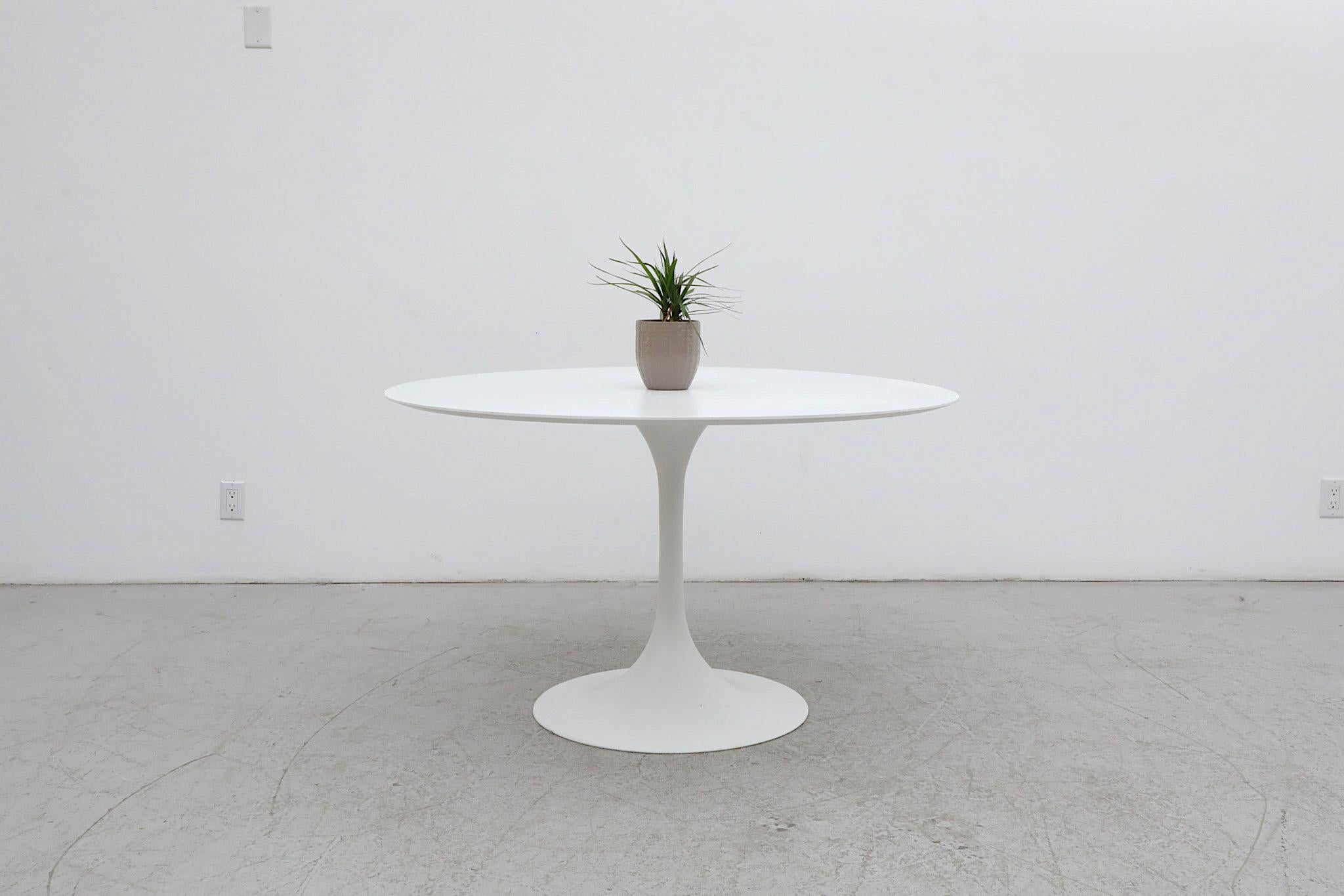 Sleek and stylish all white tulip base dining table designed by Cees Braakman in the style of Eero Saarinen for Pastoe. The Netherlands. It can be said that Braakman was almost literally born to design for the company having been born above the