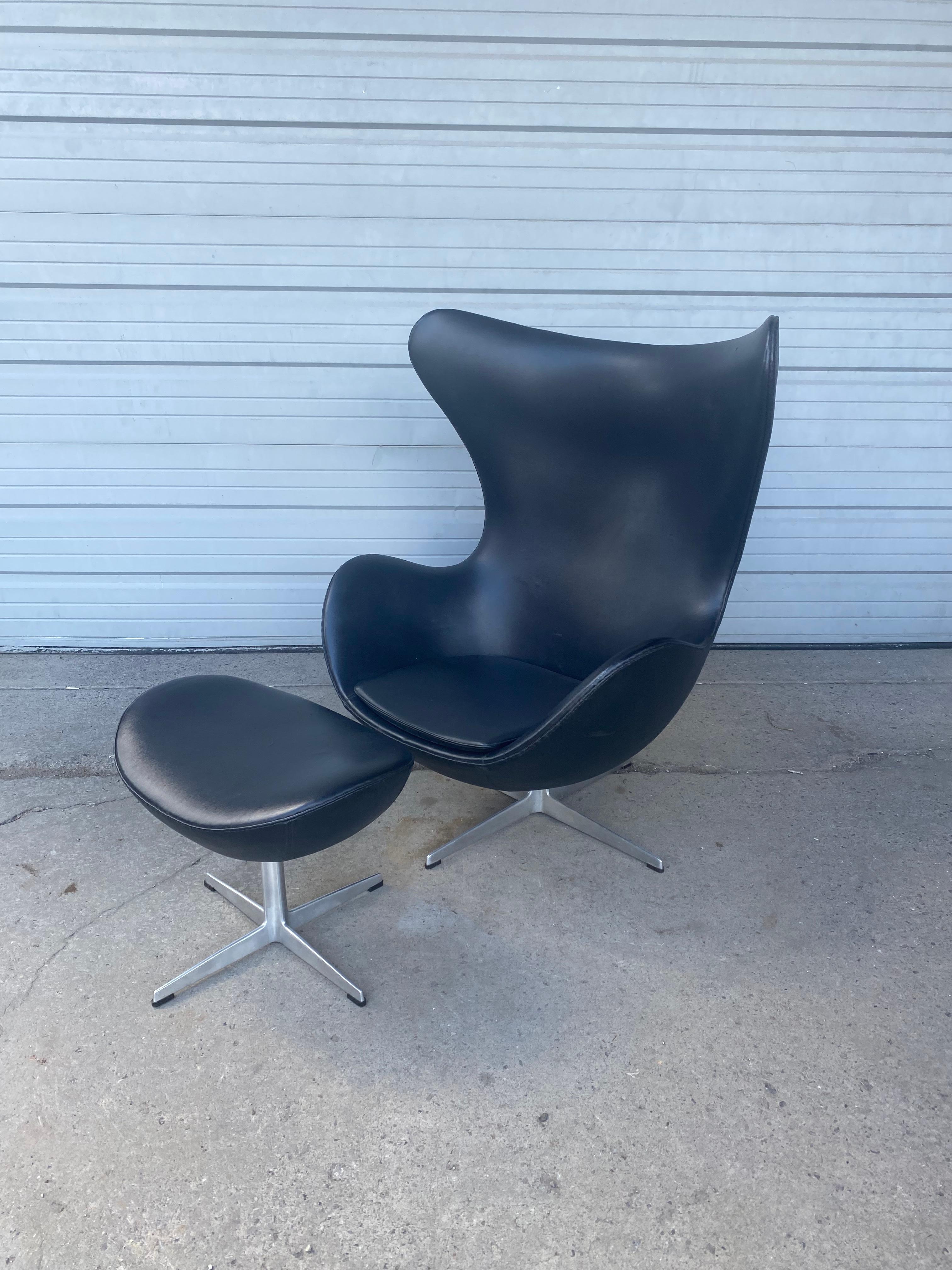 Classic mid century egg chair & ottoman by Arne Jacobsen / Fritz Hansen / Denmark c.1967... Retains original naugahyde upholstery,, Nice original condition,, Also retains original Fritz Hansen labels,,Hand delivery avail to New York City or anywhere