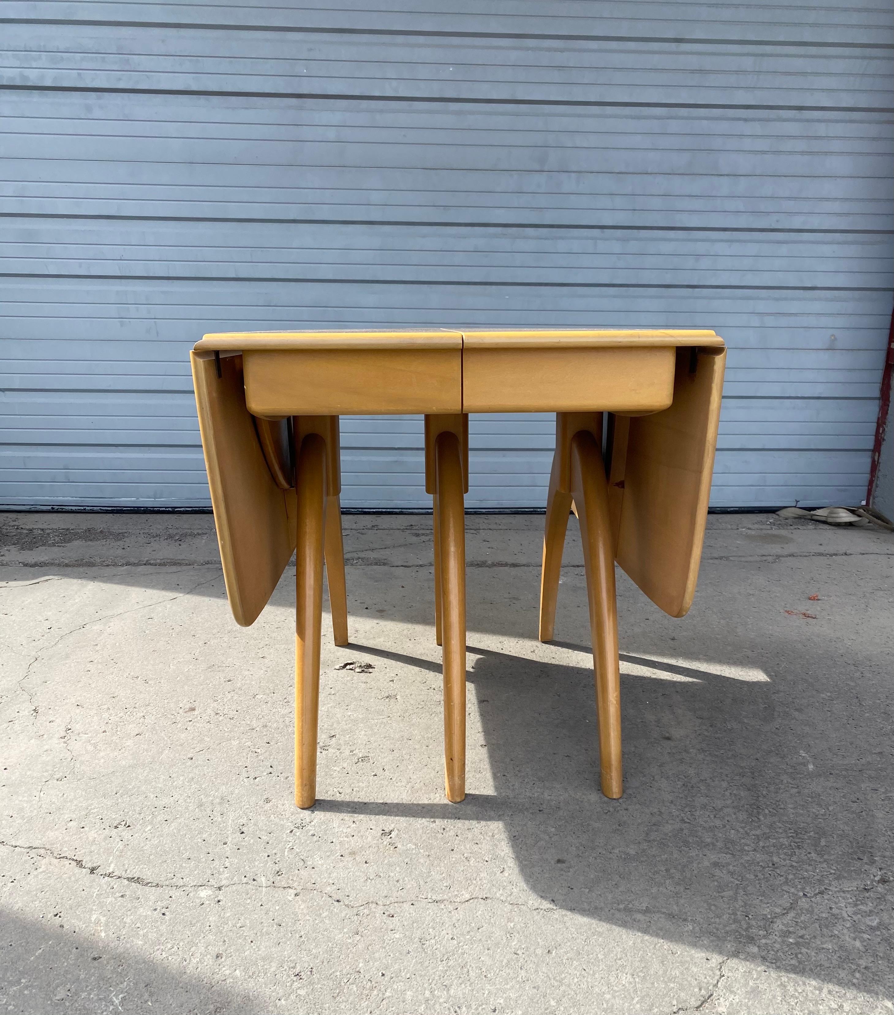 Classic mid century Heywood-Wakefield butterfly drop-leaf wishbone dining table in beautiful 