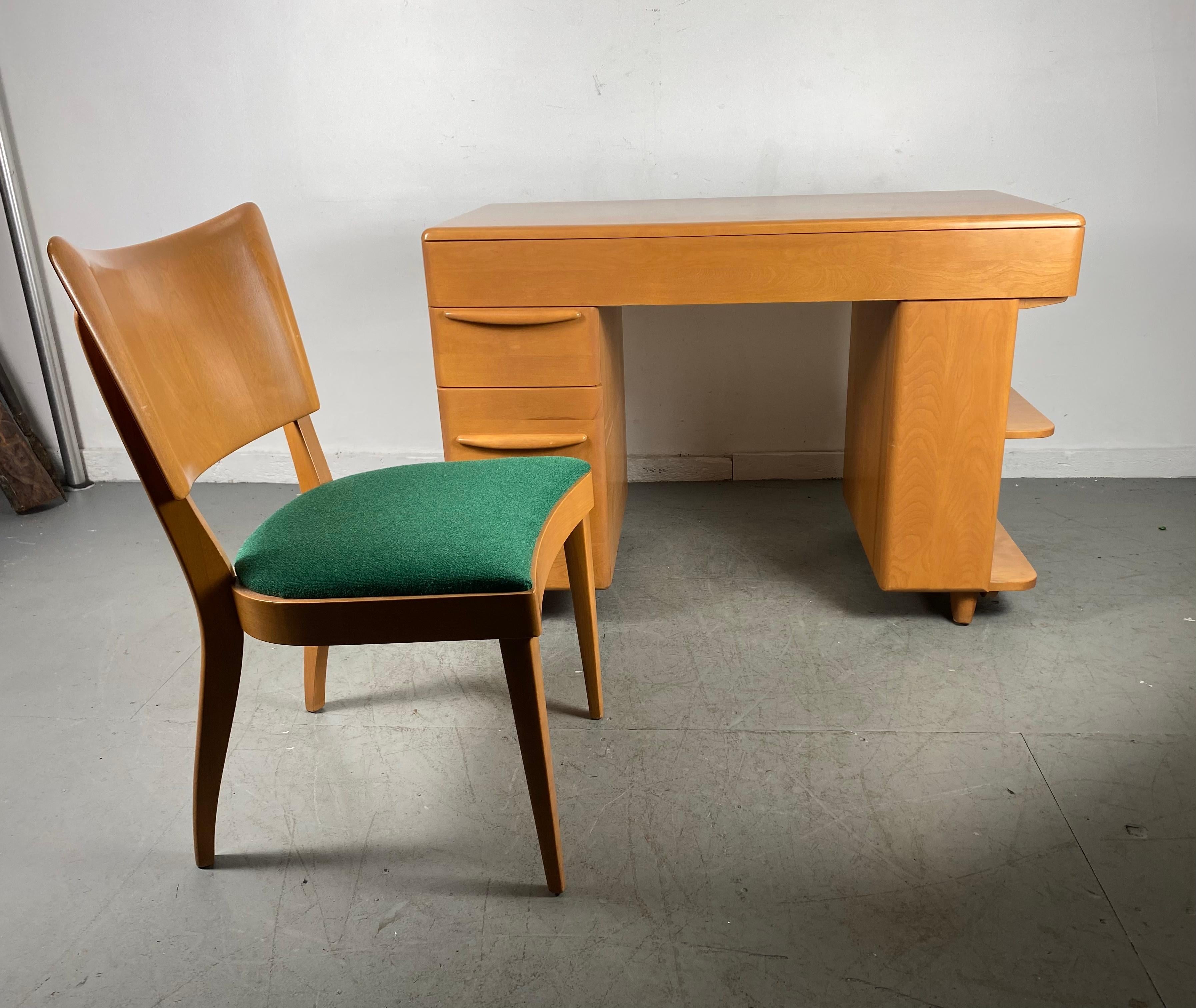 Classic Mid Century Modern Heywood Wakefield desk and chair, Amazing design, Superior quality and construction, Solid birch wood, Featuring full top drawer, large file drawer. Bookcase side, Retains original 