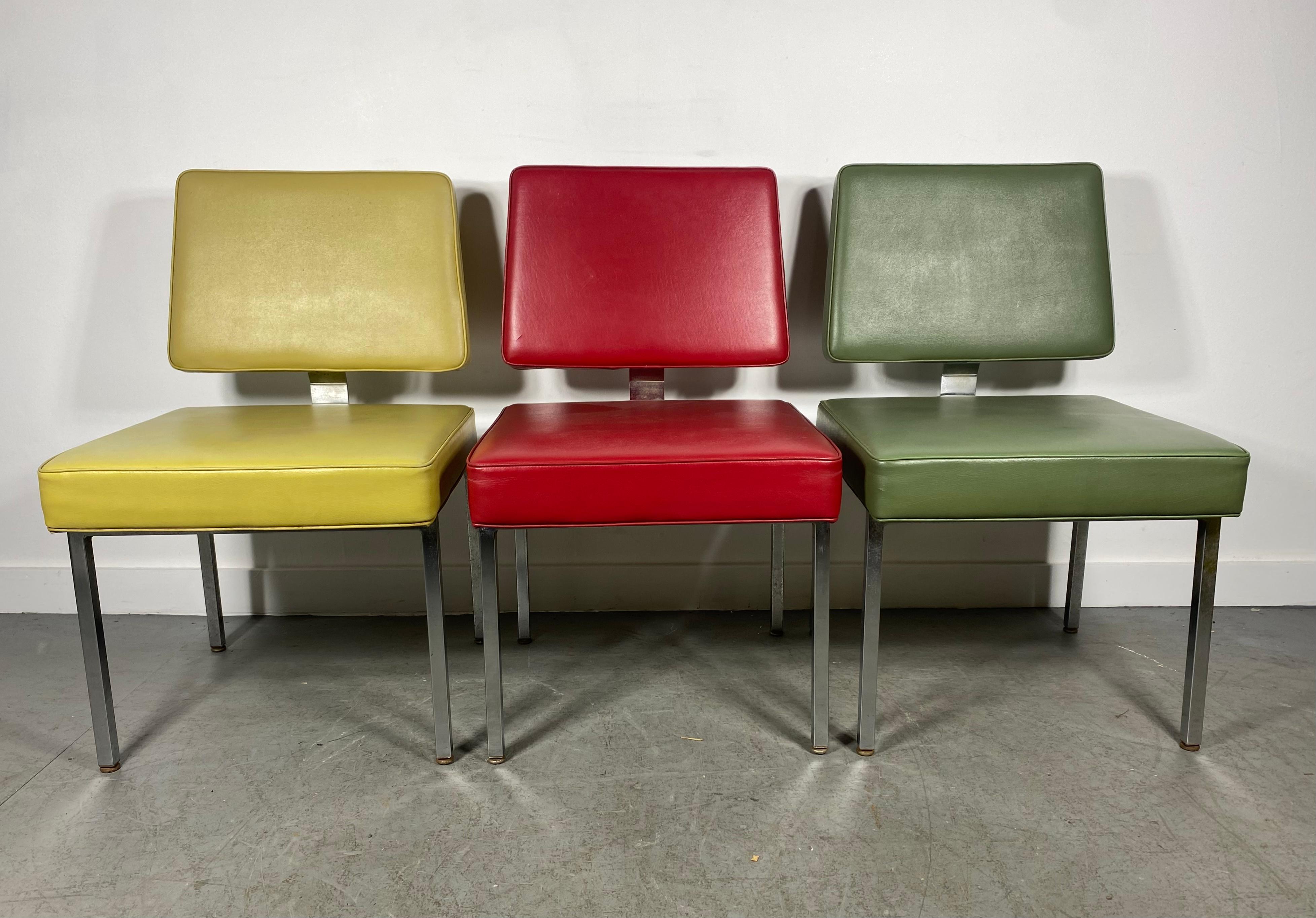 Classic Mid-Century Modern Chrome and Naugahyde Side Chairs in the manner of Florence Knoll, made by SIGNORE INC.Classic style and design, Amazing quality and construction, Retains original upholstery, great colors. Hand delivery avail to New York