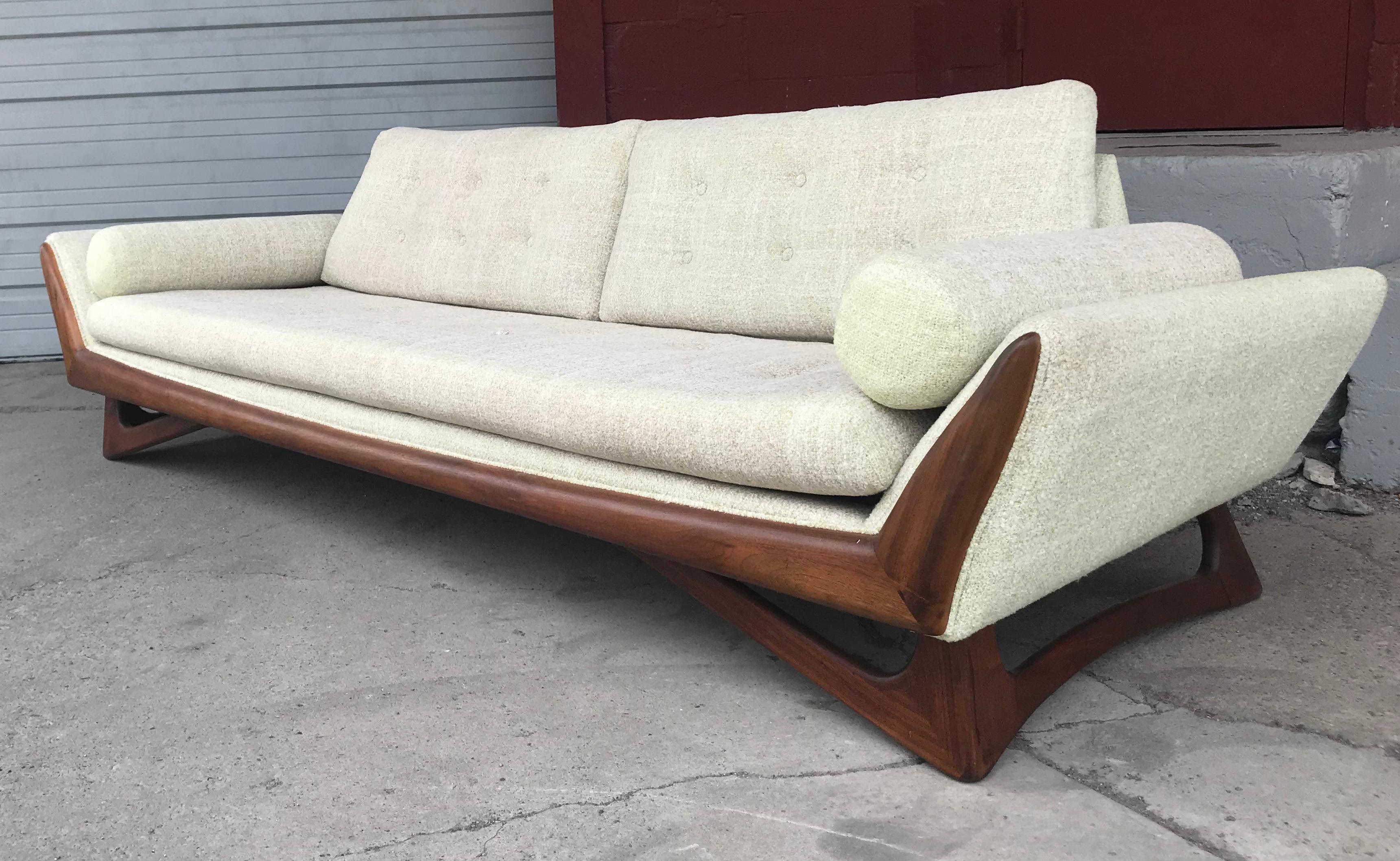 Classic Mid-Century Modern sofa designed by Adrian Pearsall, show-stopper! Stunning sculptural walnut wood base, off-white wool fabric, minor sun fading, sofa measuring 102