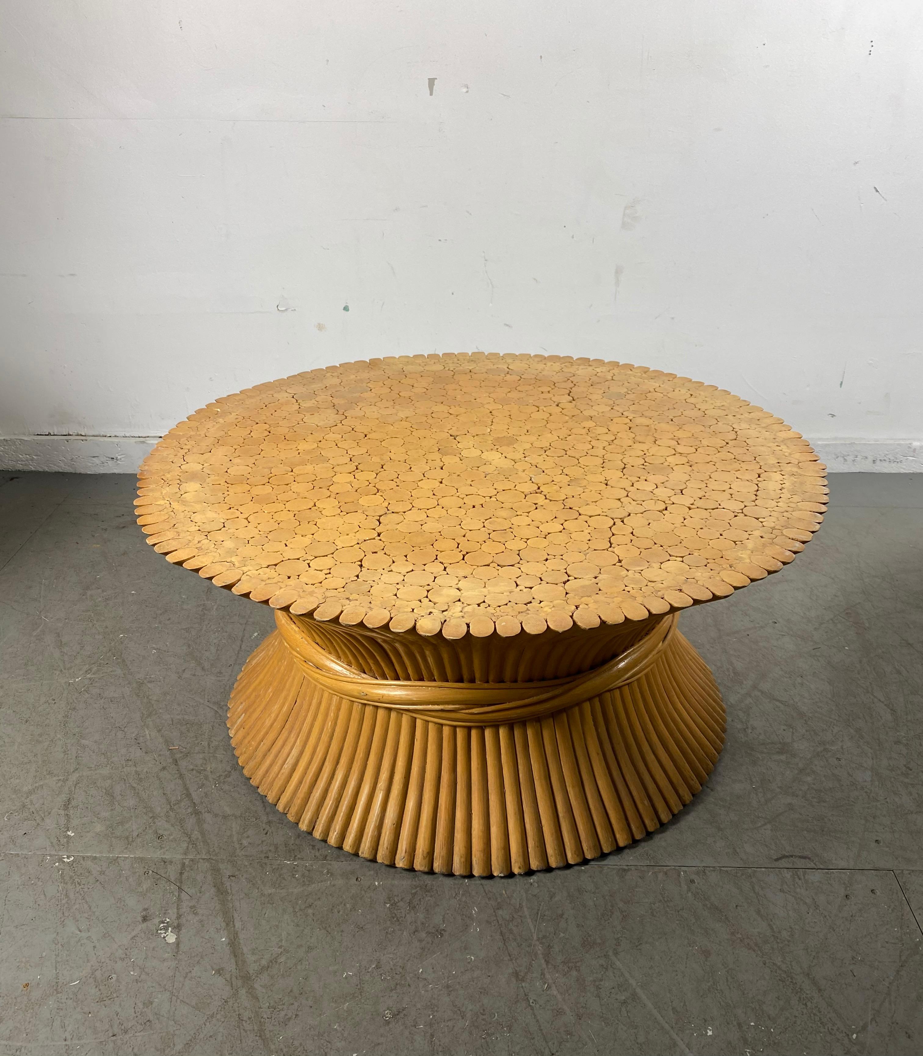 Classic Mid-Century Modernist, Hollywood Regency coffee / cocktail table by McGuire of San Francisco. Beautiful bundle of wheat form constructed of bamboo, age appropriate wear. Hand delivery avail to New York City or anywhere en route from Buffalo