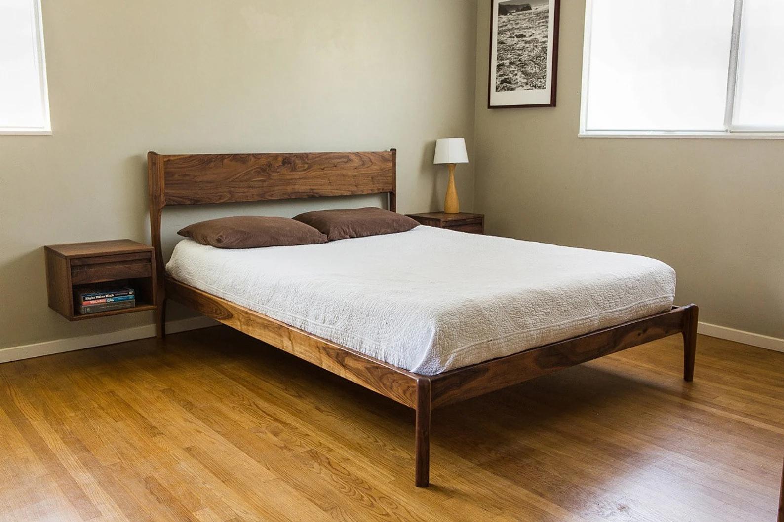 This beautiful King bed is designed by yours truly and hand-built in Long Beach, CA. The bed is most often ordered in walnut (thumbnail photo) but also shown in combination wood and cherry. Can be made from any type of you desire (and any size.