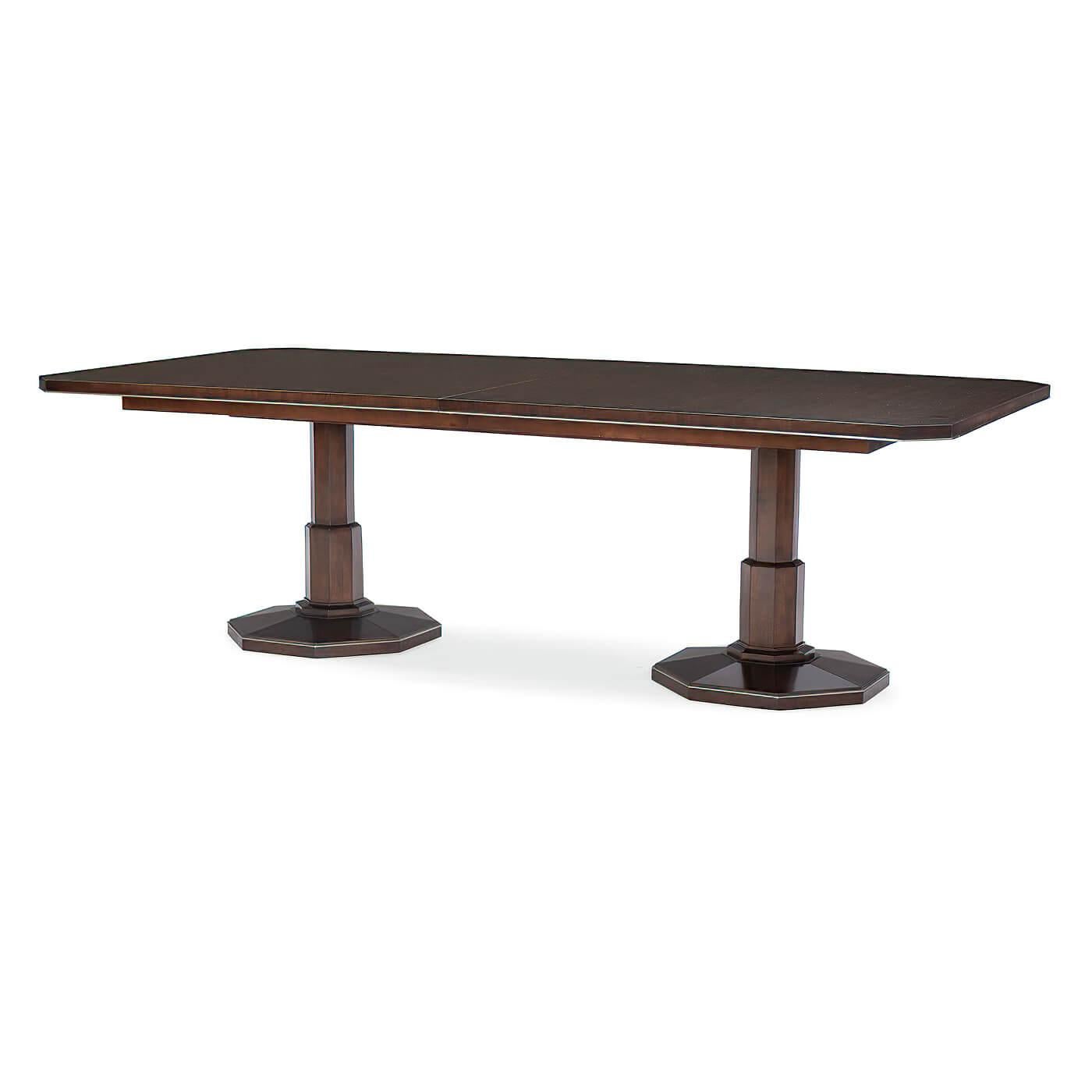 A classic modern extension dining table with luxuriously appointed details. With classic inspirations from the Art Deco period, its top features a book-matched Cathedral Walnut veneers accentuated by rich tones of a Mocha Walnut finish. Highlights