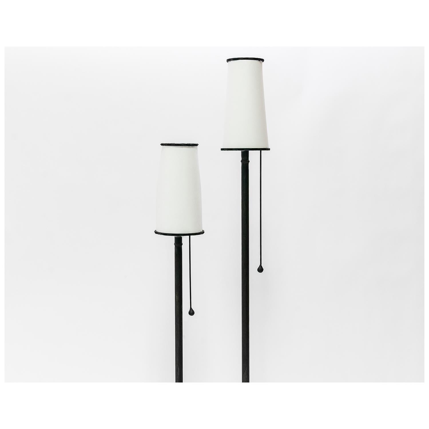 LAMP NO. 2 
J.M. Szymanski
d. 2020

This special floor lamp features a linen shade and a carved steel base.  A single tear drop pull is used to operate the lamp. 

Custom sizes available. Made in the Bronx, New York, USA.

Our products are