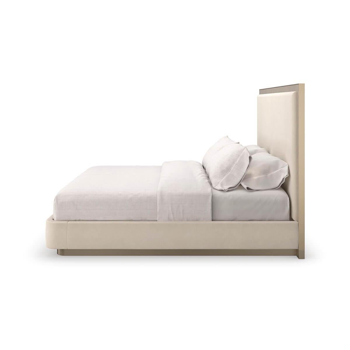 Framed in Koto veneers with a subtle Chevron pattern inspired by early Greek motifs, its parsons-style headboard is dressed in a wool-like flannel that is soft yet durable and capped on all three sides in glinting Brushed Gold metal.

Seemingly