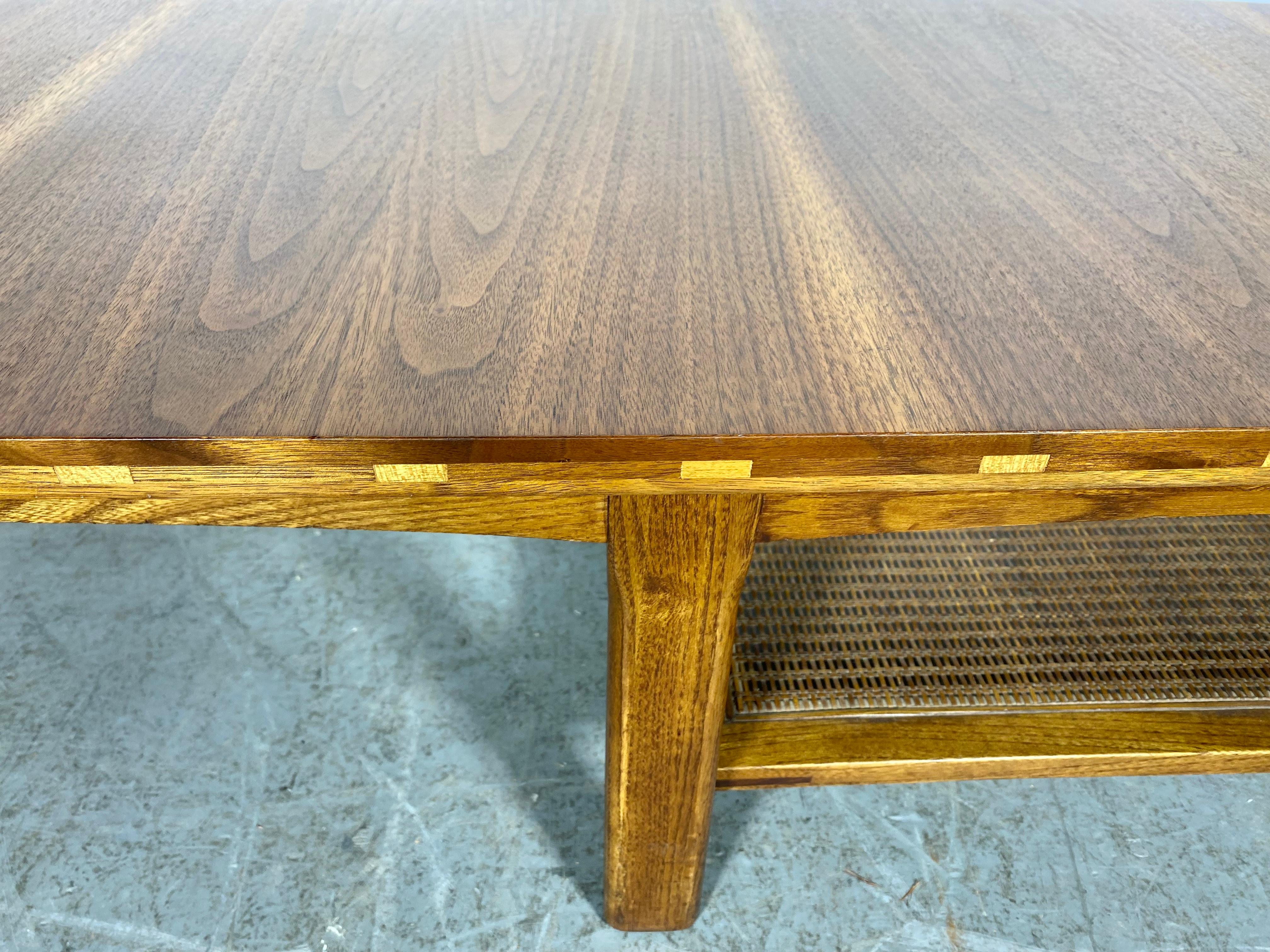 Mid-20th Century  Classic Modernist Coffee / cocktail table (long-john) Walnut with woven shelf
