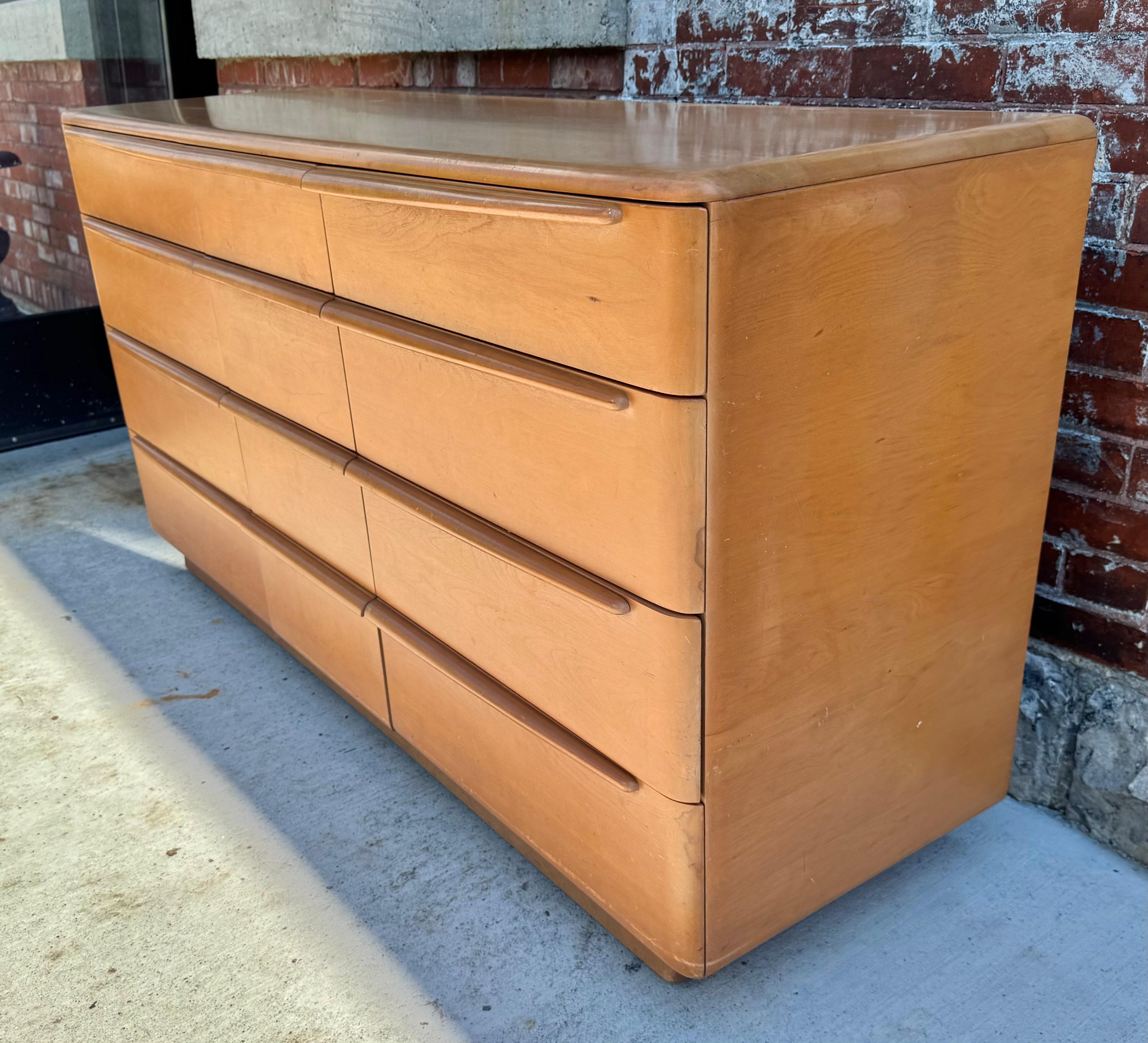 
Vintage Mid century modern solid birch wood 12 drawer dresser by Heywood Wakefield,, Great original condition,, retains original finish,, 