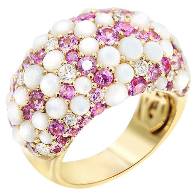 Earring (Matching Ring Available)

Yellow Gold 18K

Weight 10.15 grams

Diamond 14-Bril.Cut-0.53 ct G/SI1A

Mother of Pearl 66-3.09 ct

Pink Sapphire 30-1.57 ct

Uncover the elegance of structural beauty with this striking ring, masterfully crafted