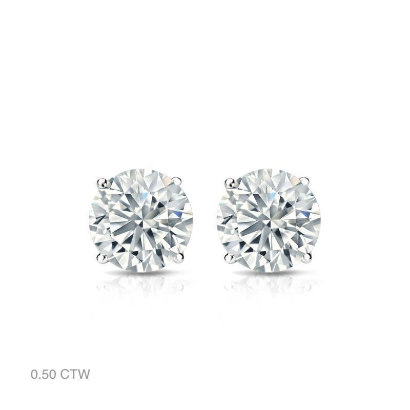 Aston Estate Jewelry présente

Boucles d'oreilles classiques et étincelantes en or blanc 14 carats, ornées de diamants. Chaque boucle d'oreille est ornée d'un diamant solitaire de taille ronde et brillante, serti sur quatre griffes. Choisissez parmi