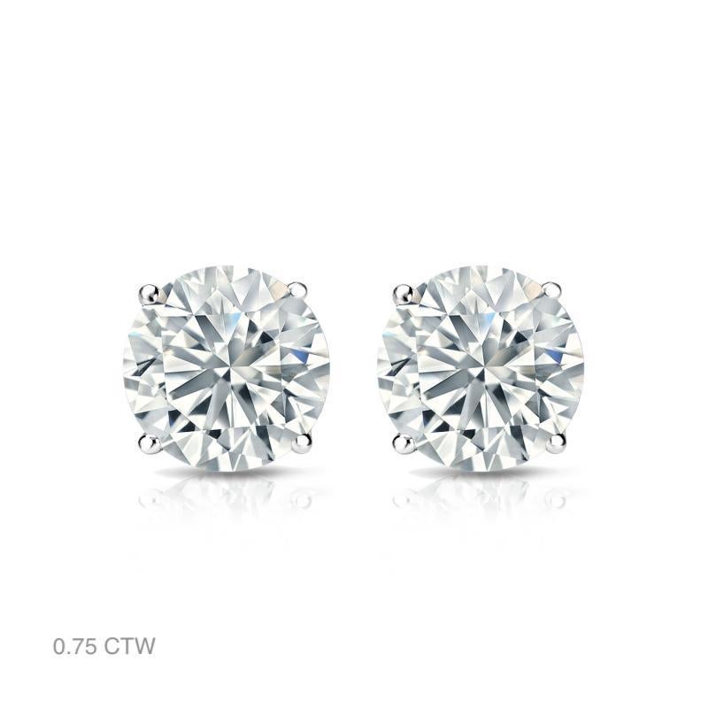 Aston Estate Jewelry Presents:

Classic, sparkling diamond stud earrings in 14K white gold. Each earring features a solitaire round brilliant cut diamond set with four prongs. Choose from a variety of size options, ranging from 0.50 ct total weight