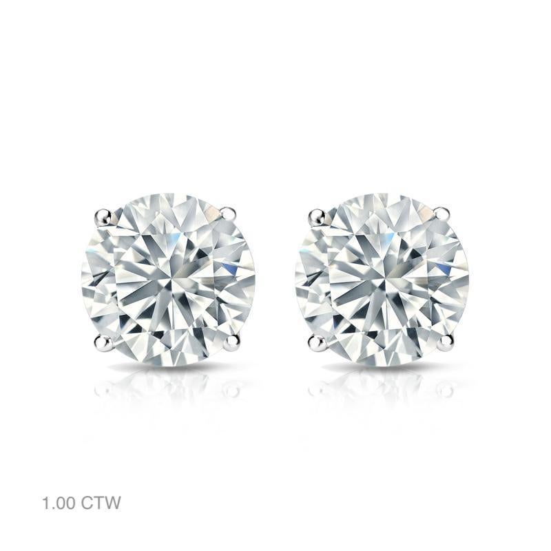 Aston Estate Jewelry Presents:

Classic, sparkling diamond stud earrings in 14K white gold. Each earring features a solitaire round brilliant cut diamond set with four prongs. Choose from a variety of size options, ranging from 0.50 ct total weight