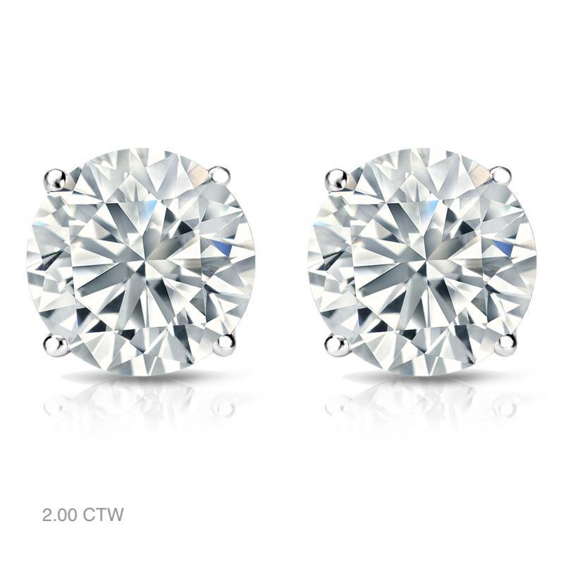 Aston Estate Jewelry Presents:

Classic, sparkling diamond stud earrings in 14K white gold. Each earring features a solitaire round brilliant cut diamond set with four prongs. Choose from a variety of size options, ranging from 0.50 ct total weight