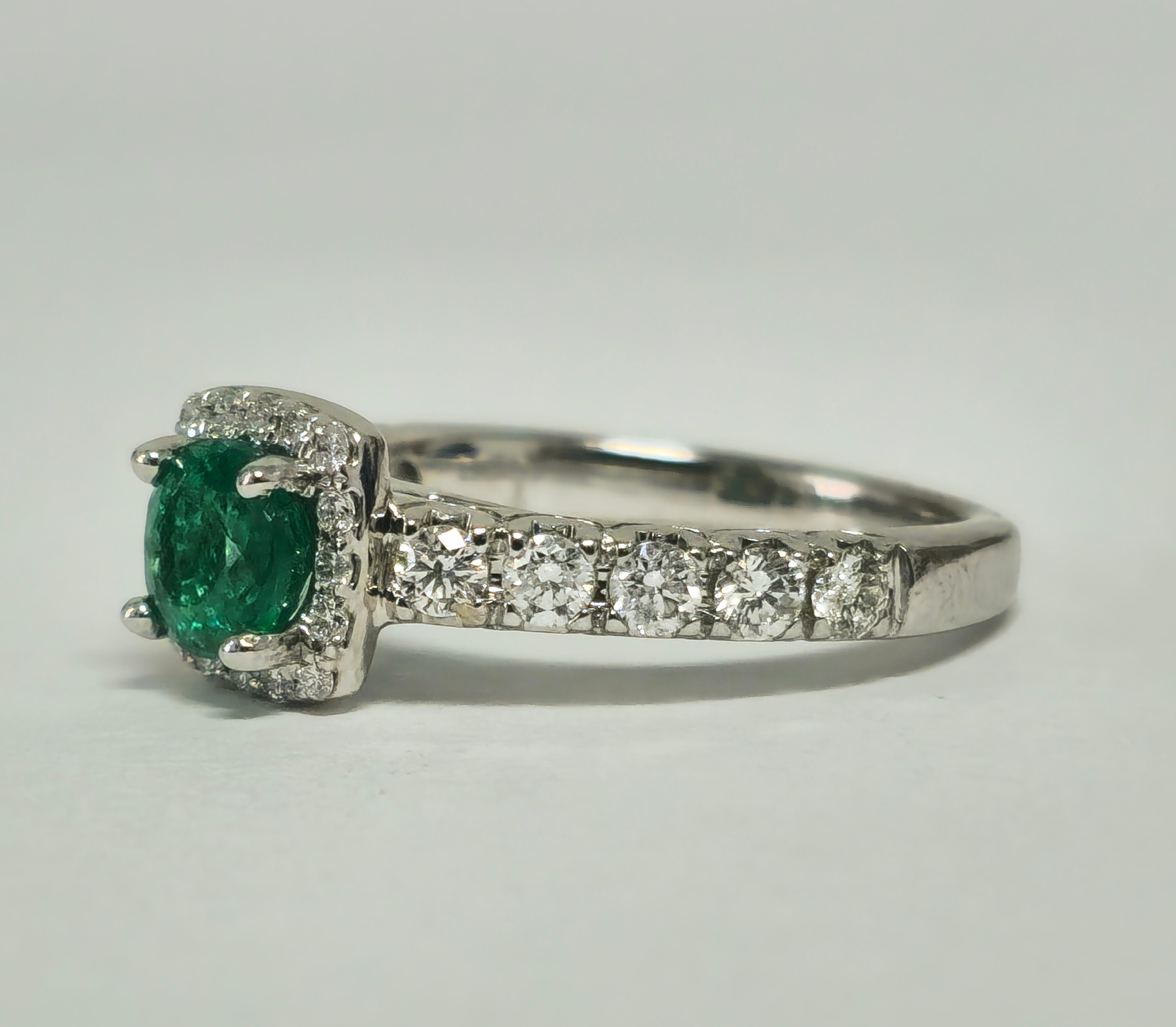 Step into elegance with our 14K white gold Emerald and Diamond Cocktail Ring, boasting a captivating 0.60 carat Colombian emerald and 0.95 carats of dazzling side diamonds. Perfect for weddings, engagements, and special events, this exquisite ring