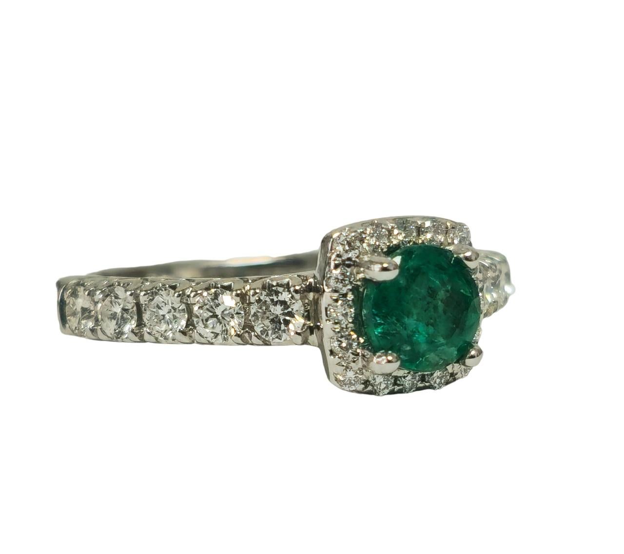 Step into elegance with our 14K white gold Emerald and Diamond Cocktail Ring, boasting a captivating 0.60 carat Colombian emerald and 0.95 carats of dazzling side diamonds. Perfect for weddings, engagements, and special events, this exquisite ring