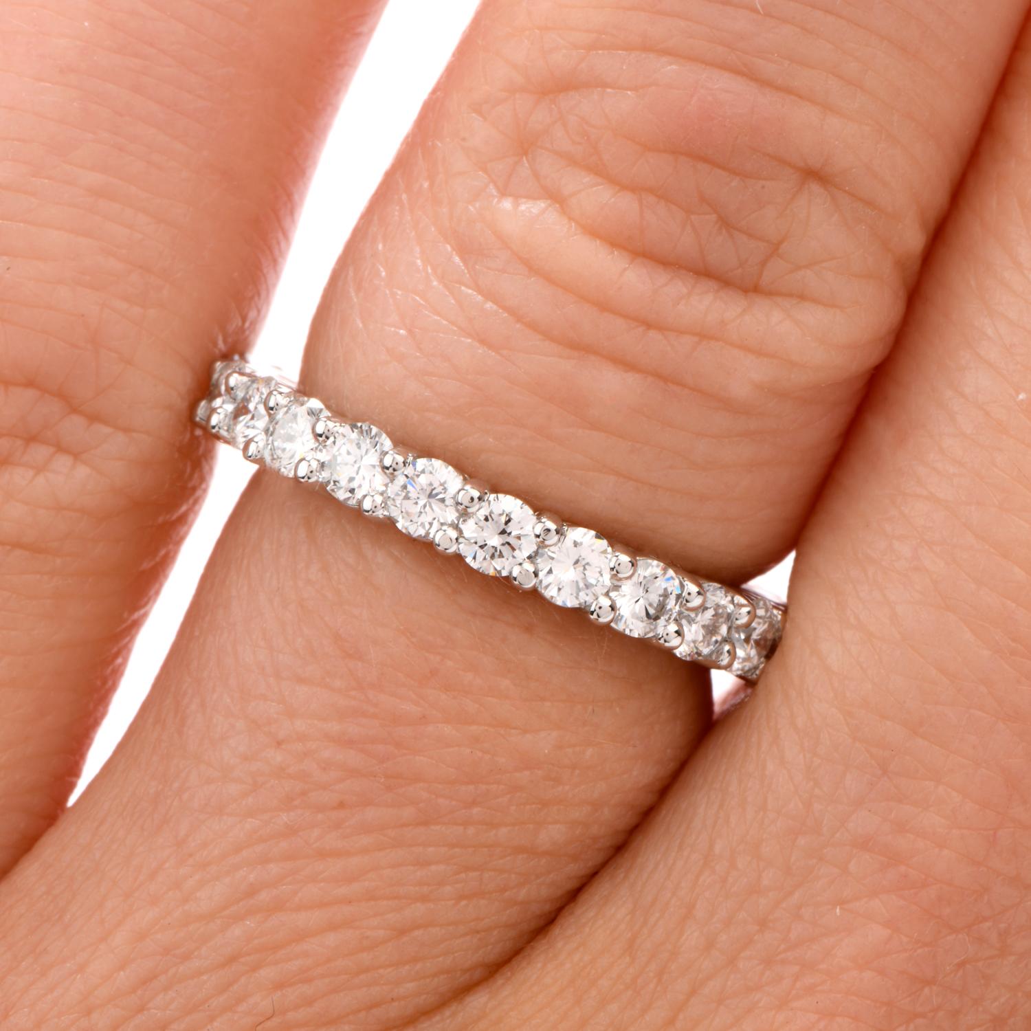 Classic Elegance! This brilliant and sparkling classic eternity band was crafted in 

Luxurious Platinum. 24 round brilliant cut Diamonds weighing appx. 1.75 carats create this endless Ring of Love. 
Graded appx. G-H color and VS2-SI1