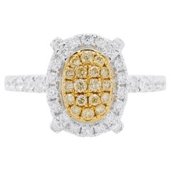 Anello classico con diamante giallo naturale e diamante bianco