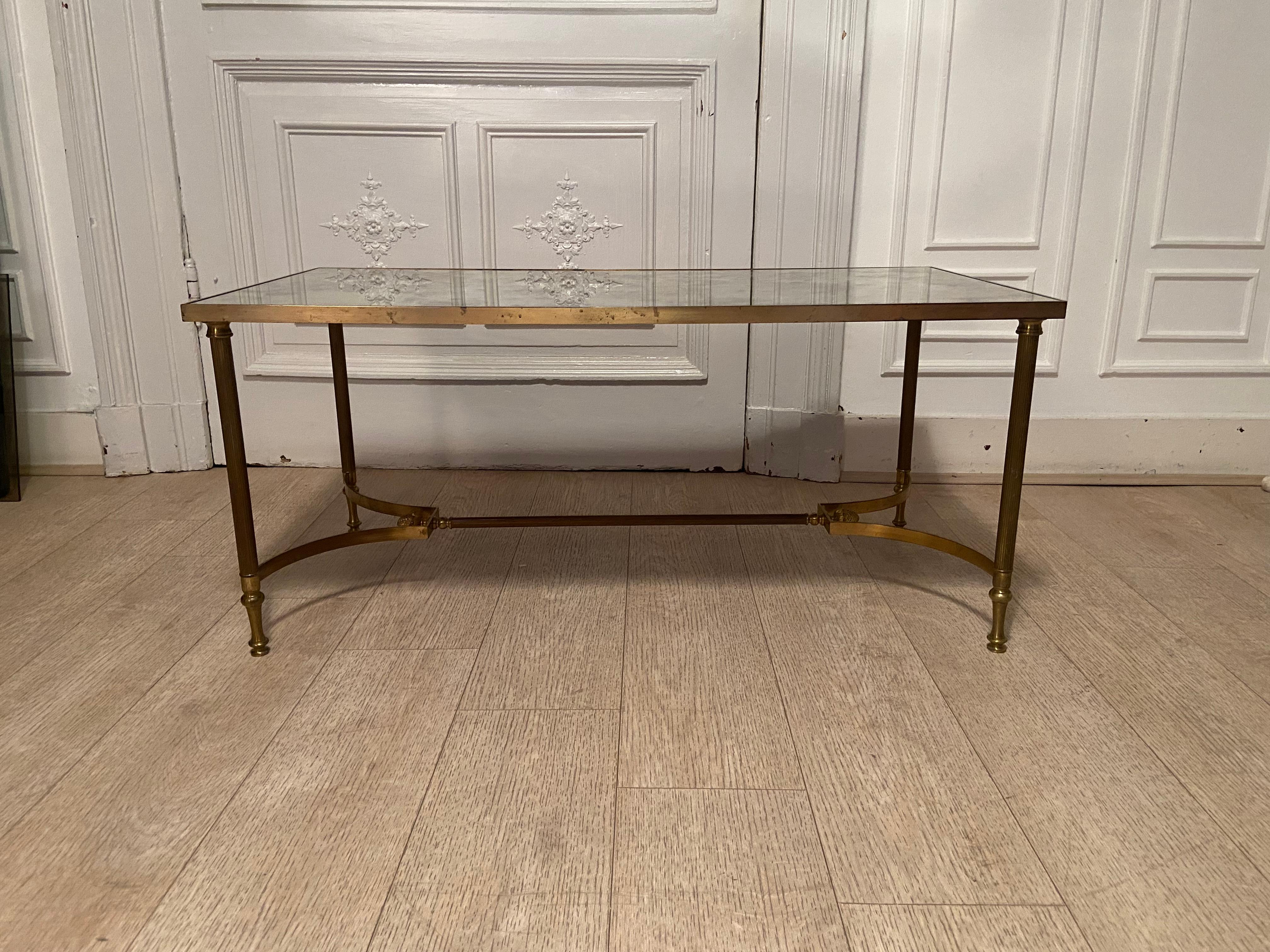 Classic neo coffee table in brass and oxidized mirror.