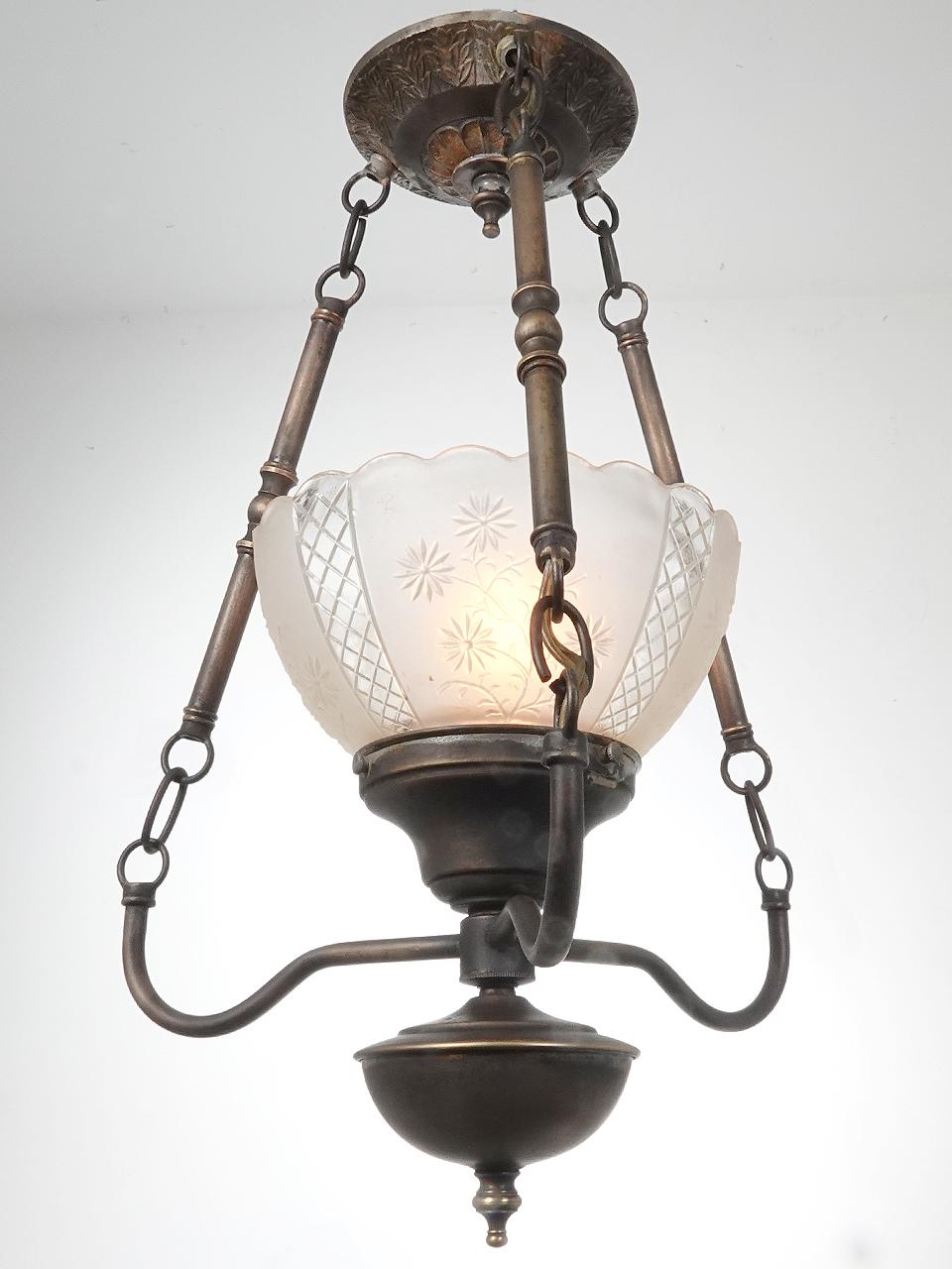 Every NY Brownstone or row house featured a small decorative lamp just inside the front door. This is a classic example of that lamp. Its all original and has just the right look.