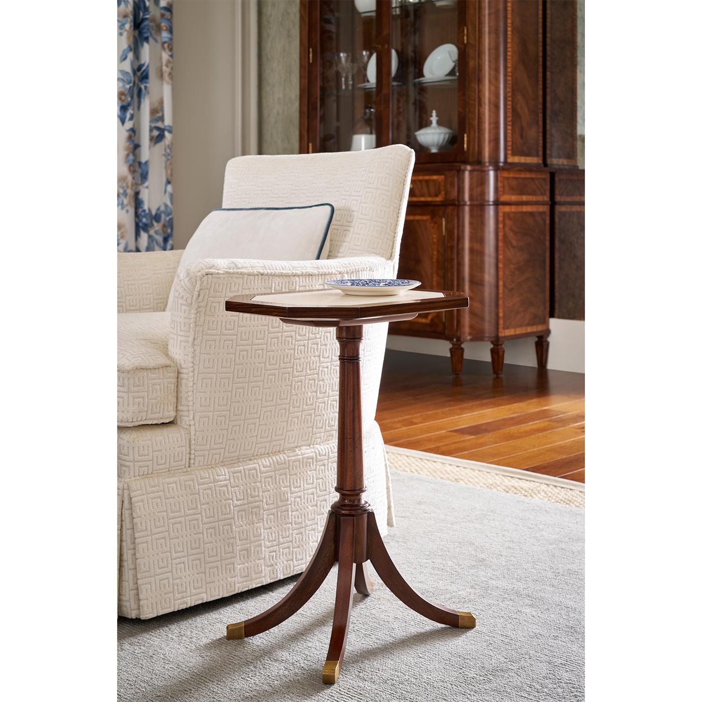 Bring refined Regency-era style into the modern home with its elegant proportions and luxurious craftsmanship. The octagonal top features an inset marble top with a wooden border.

A turned pedestal base supports the top with graceful symmetry,