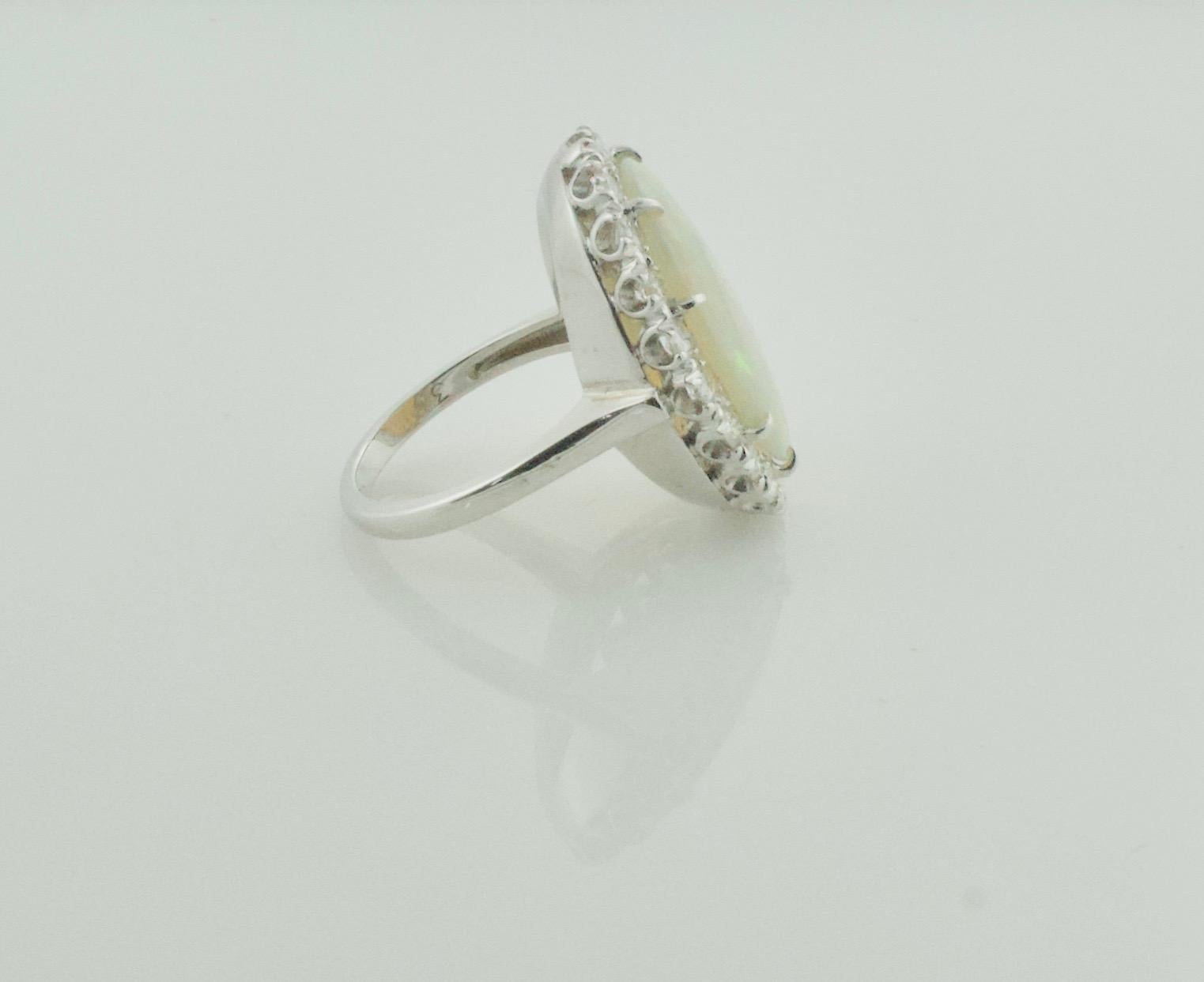Round Cut Classic Opal and Diamond Ring in White Gold, circa 1960's