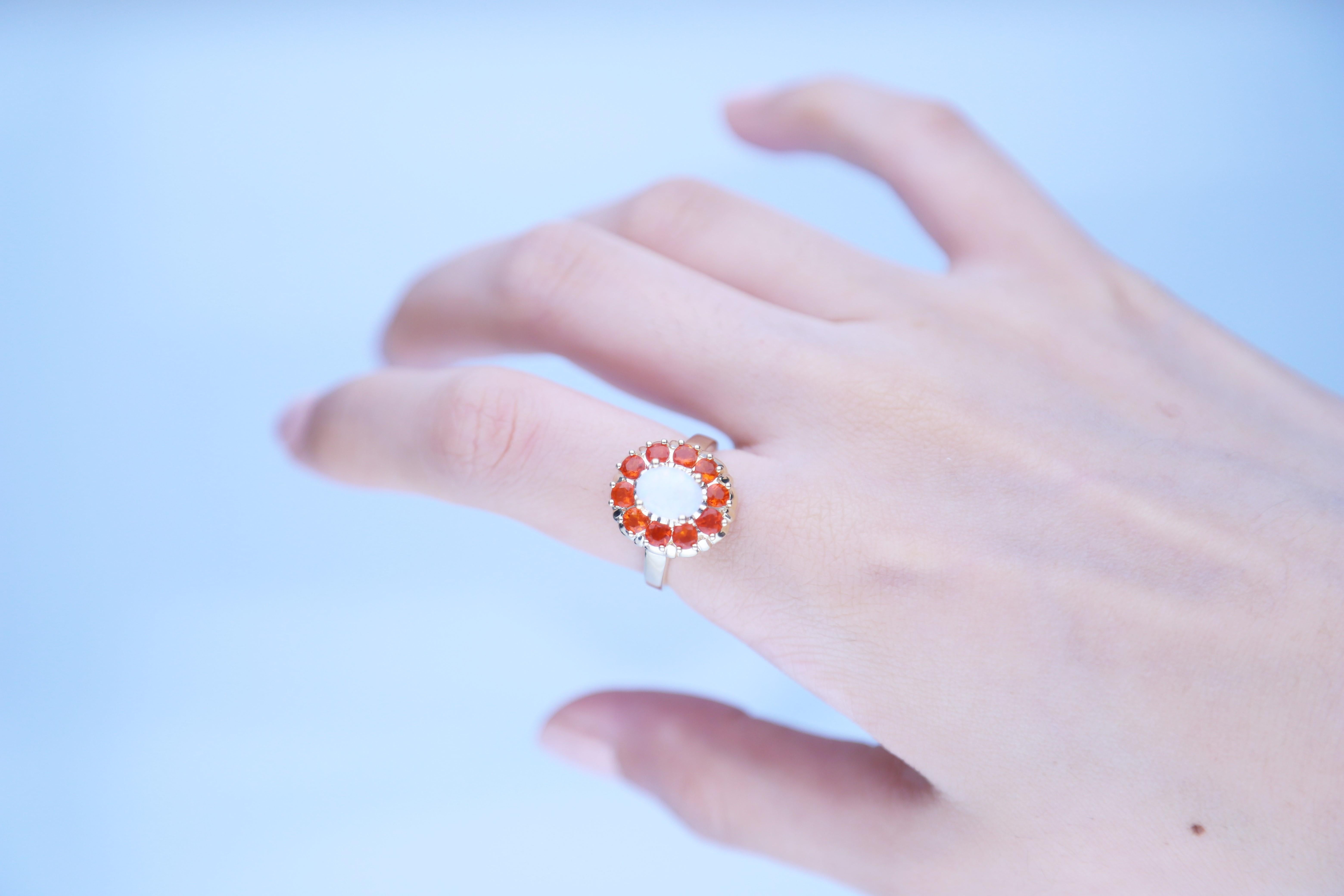 Stunning, timeless and classy eternity Unique Ring. Decorate yourself in luxury with this Gin & Grace Ring. The 14K Yellow Gold jewelry boasts with Oval-Cab Australian Opal 1 pcs 0.77 carat, Fire Opal (10 Pcs) 0.78 Carat accent stones for a lovely